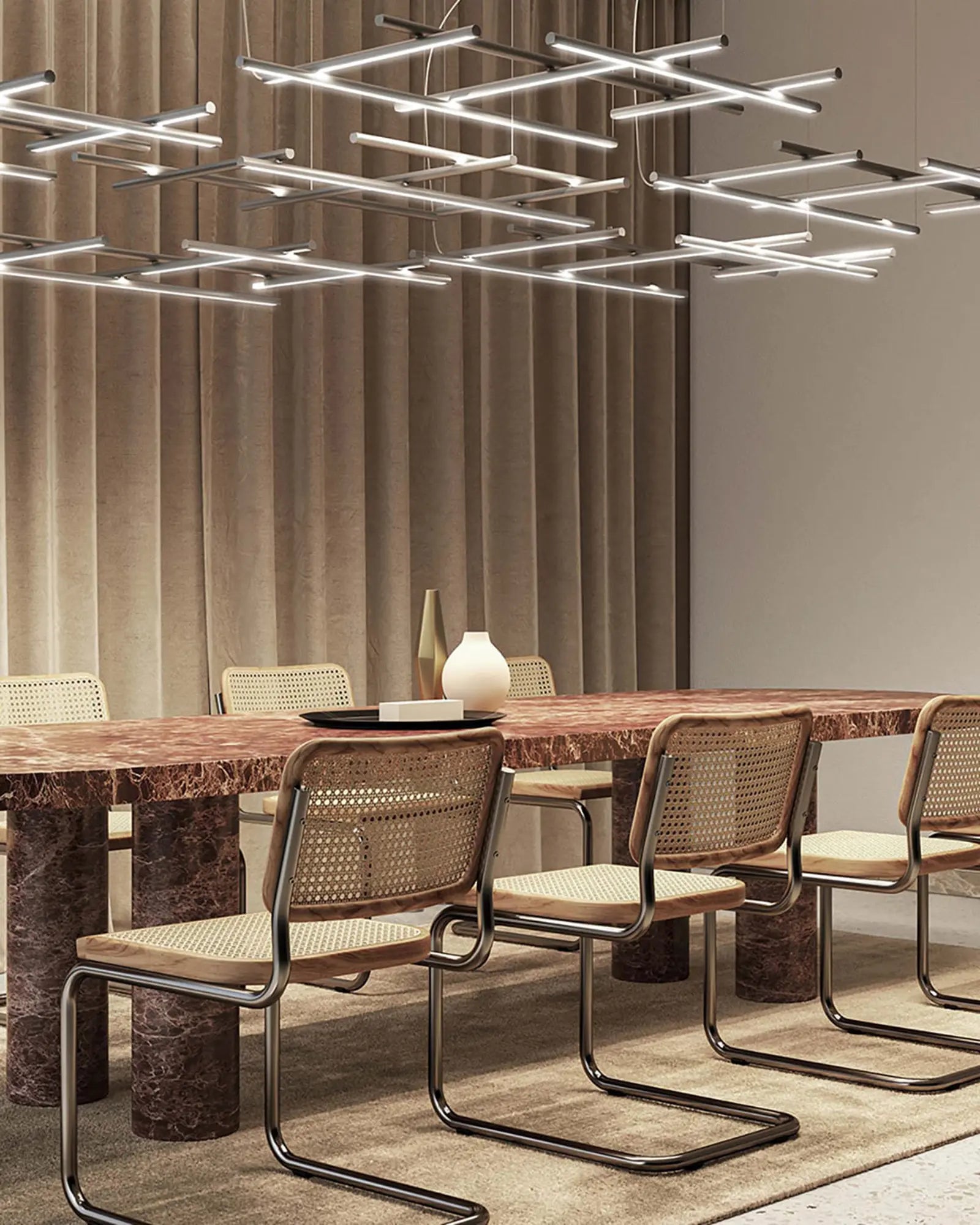 Hilow line pendant light cluster above a dining table