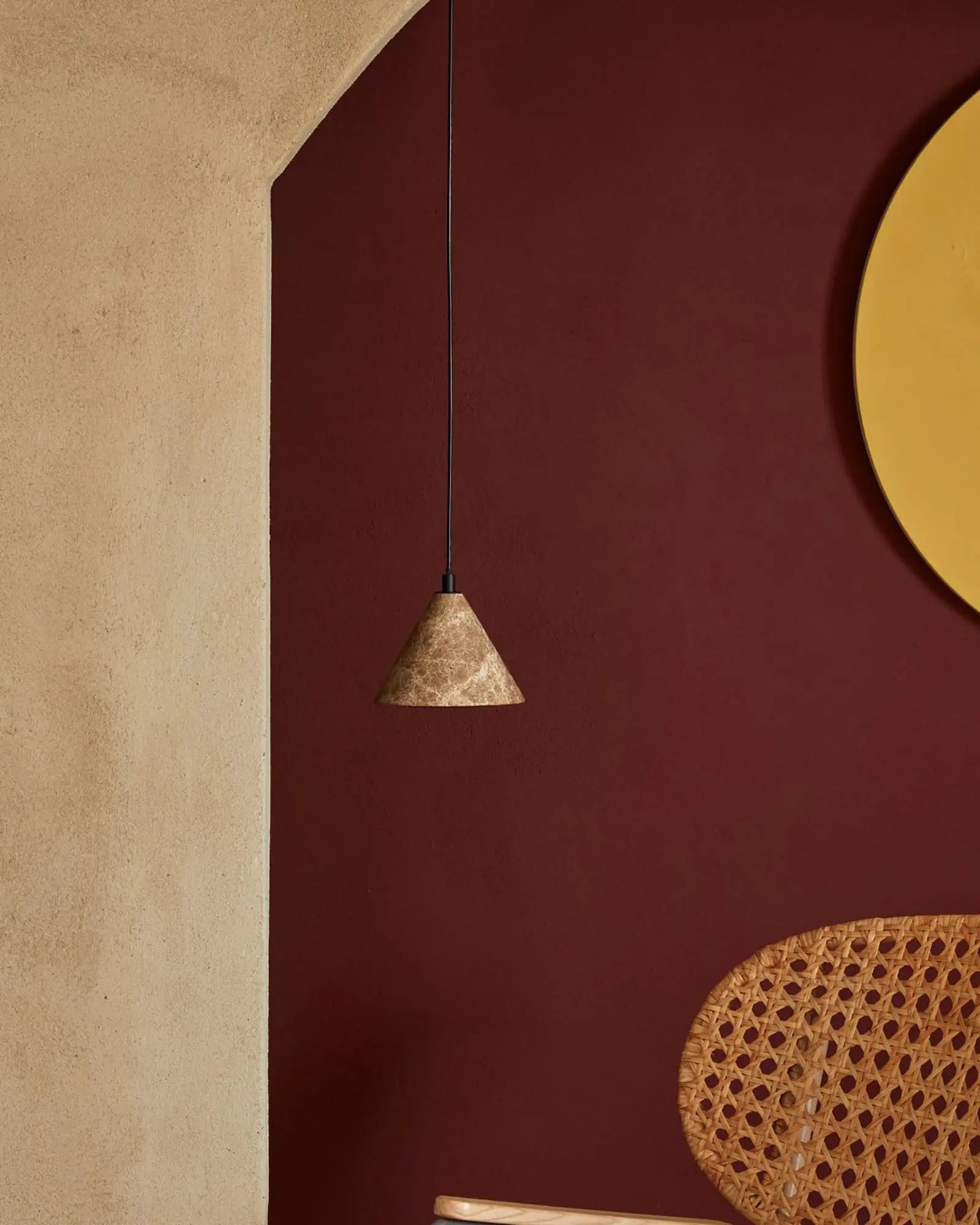 Iconic Conic marble pendant light in lounge area