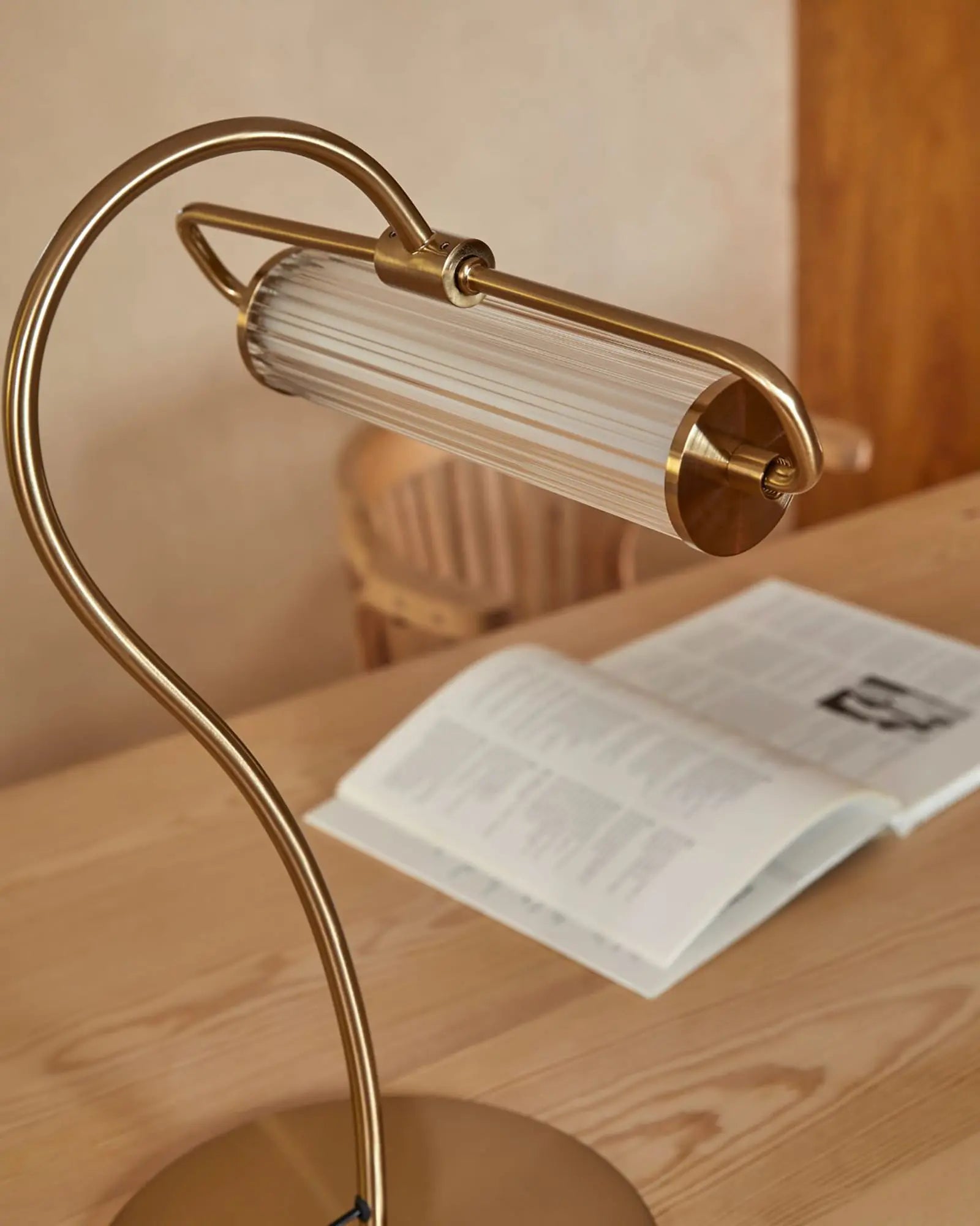 Ison contemporary pendant light with ribbed glass shade in brass details
