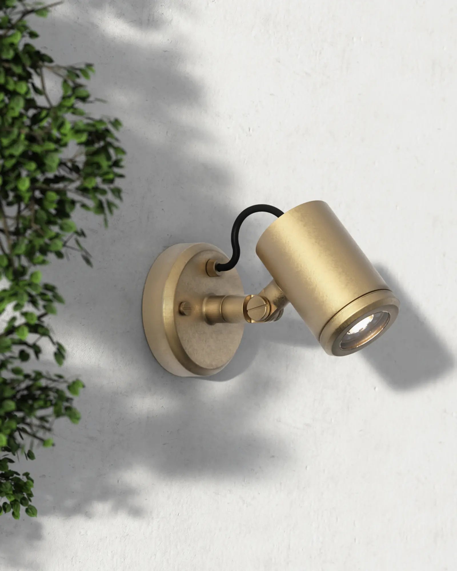 Jura contemporary coastal outdoor wall light in brass