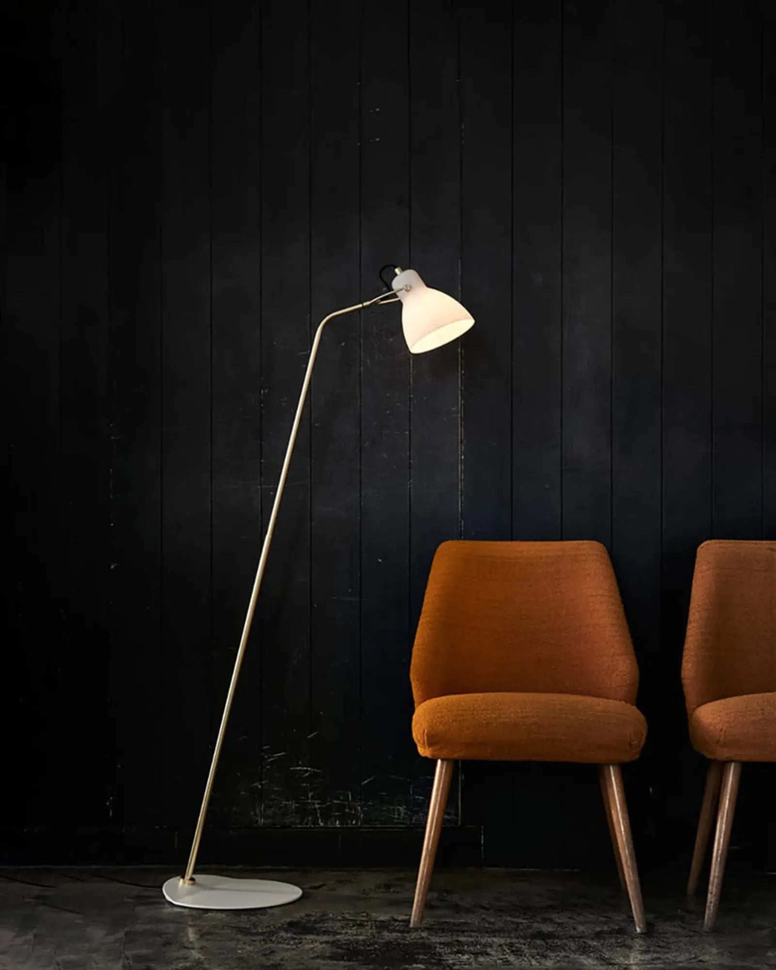Laito floor lamp above a chair