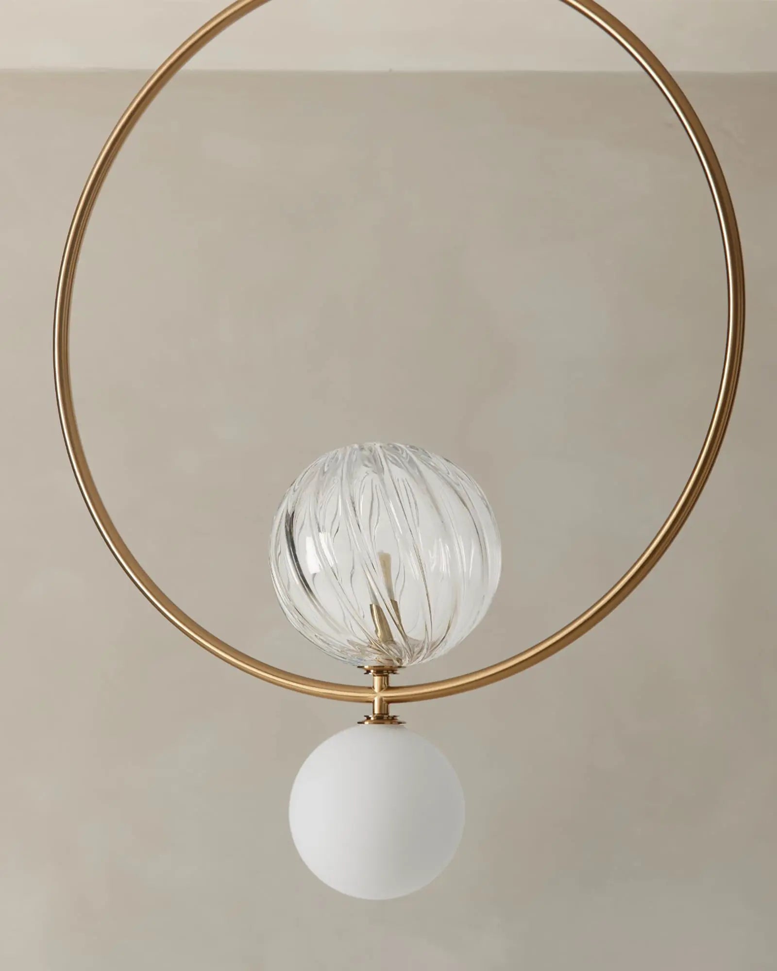 Level Contemporary ring pendant with double orb detail