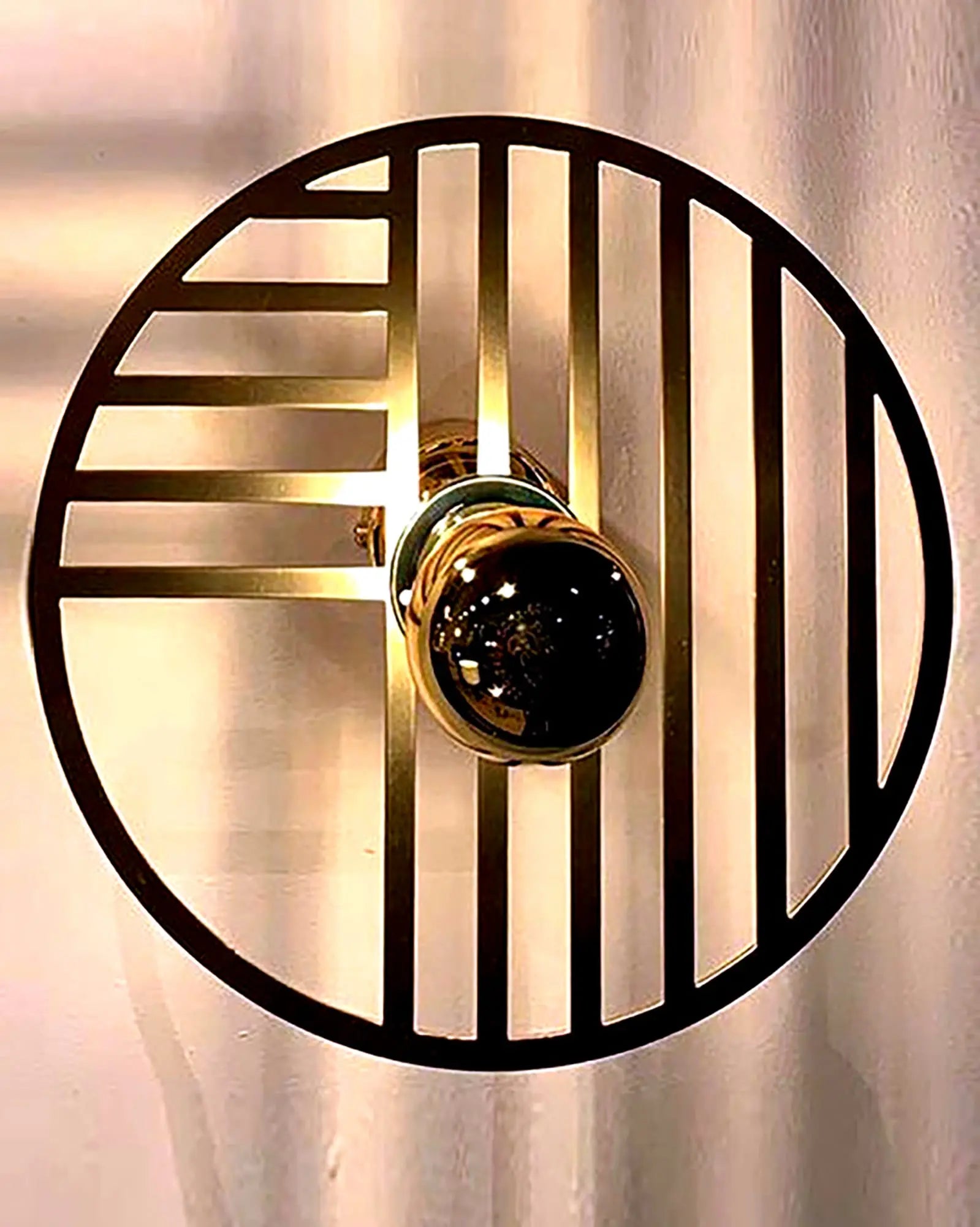 Line brass round minimal shade wall light on