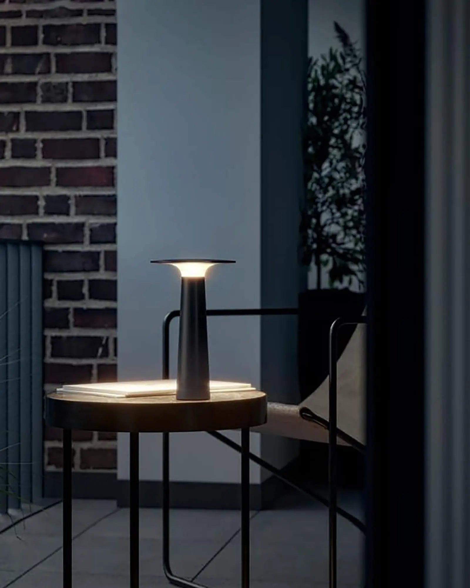Lix outdoor modern portable table lamp on a coffee table