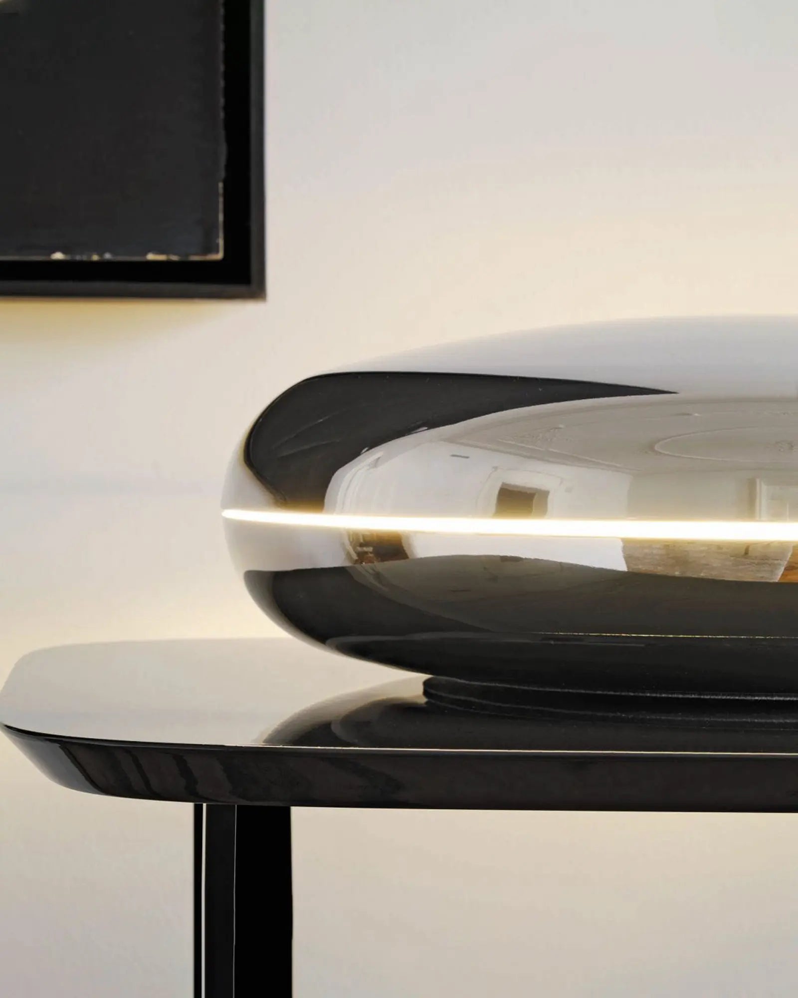 Loop Table Lamp on a coffee table
