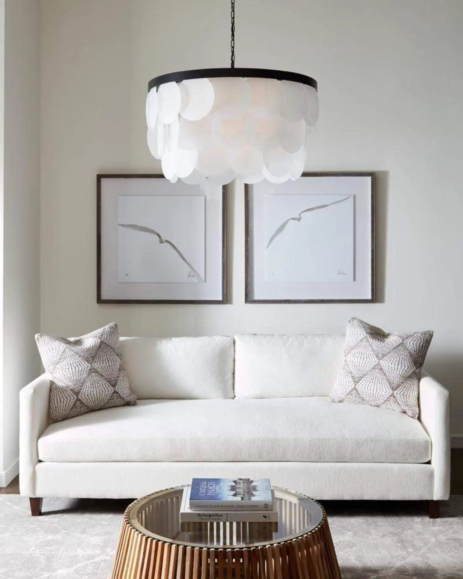 Mellita Traditional pendant light above a coffee table in a living area