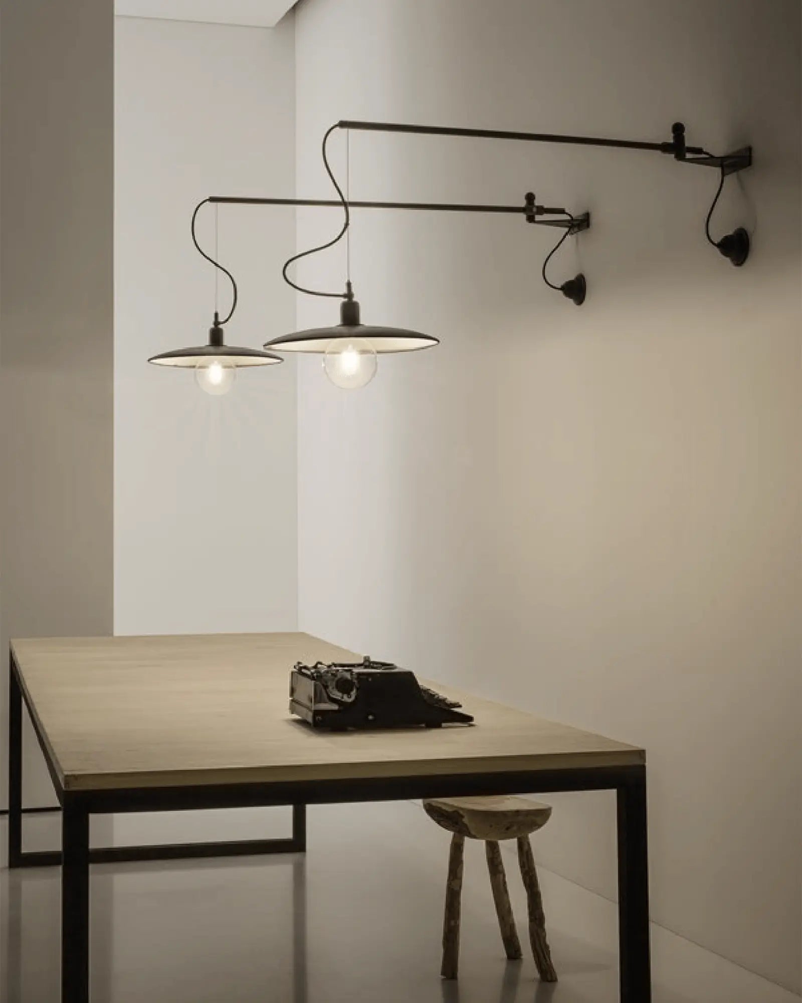 Meridiana long arm wall light above a desk