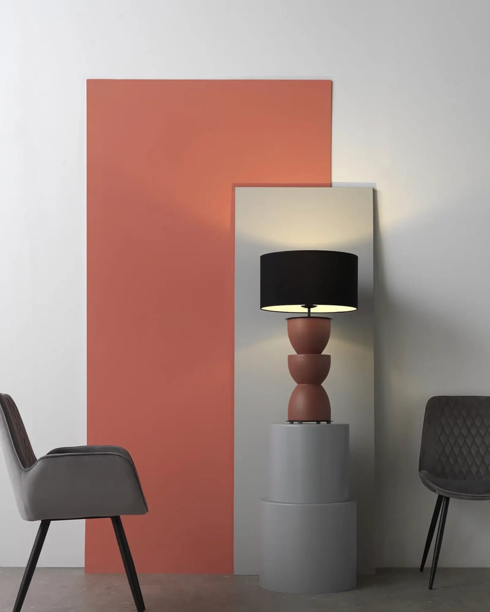Metric Ceramic and fabric shade decorative table lamp on a stall in a lounge