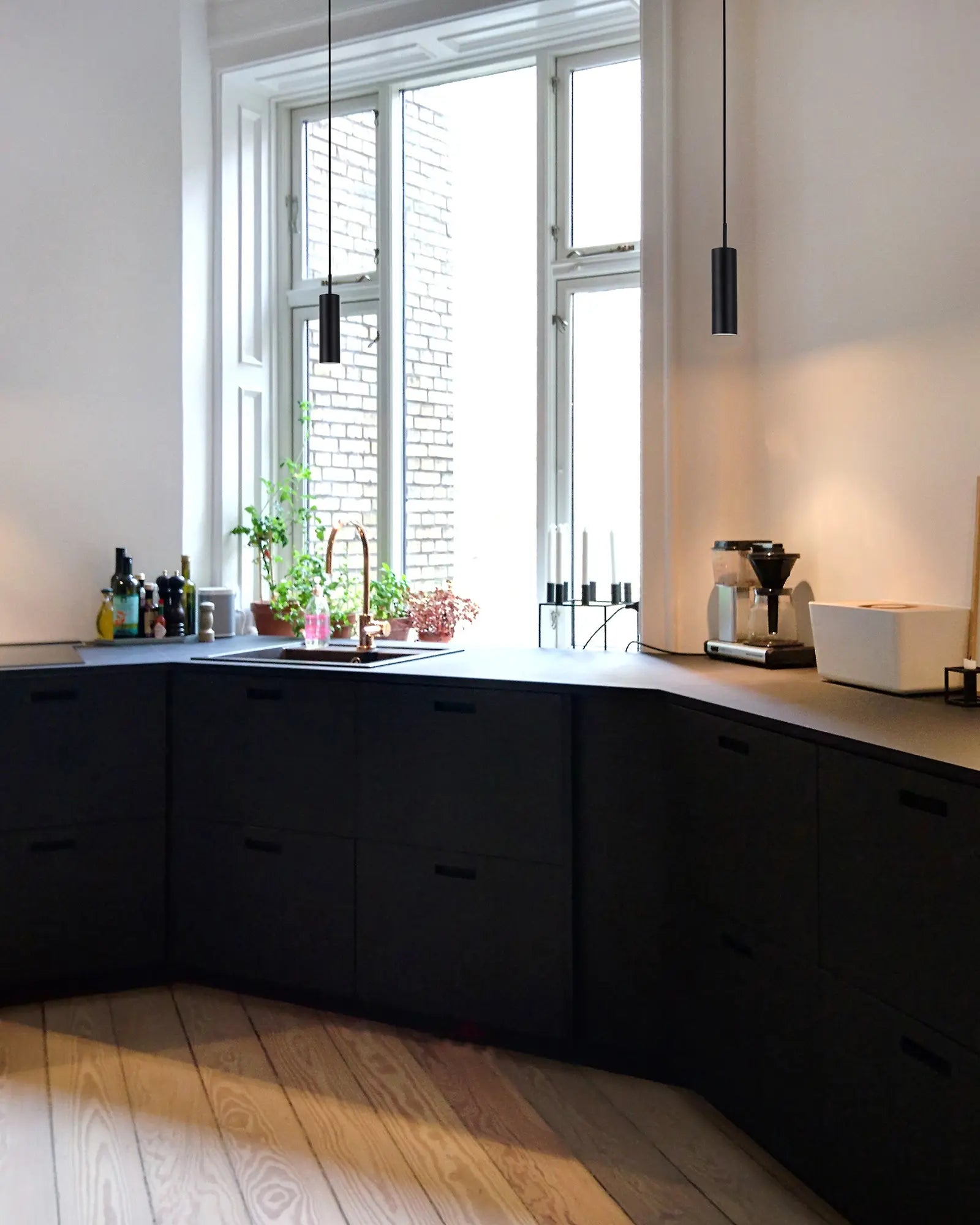 Mib 6 adjustable Scandinavian pendant light cluster above kitchen