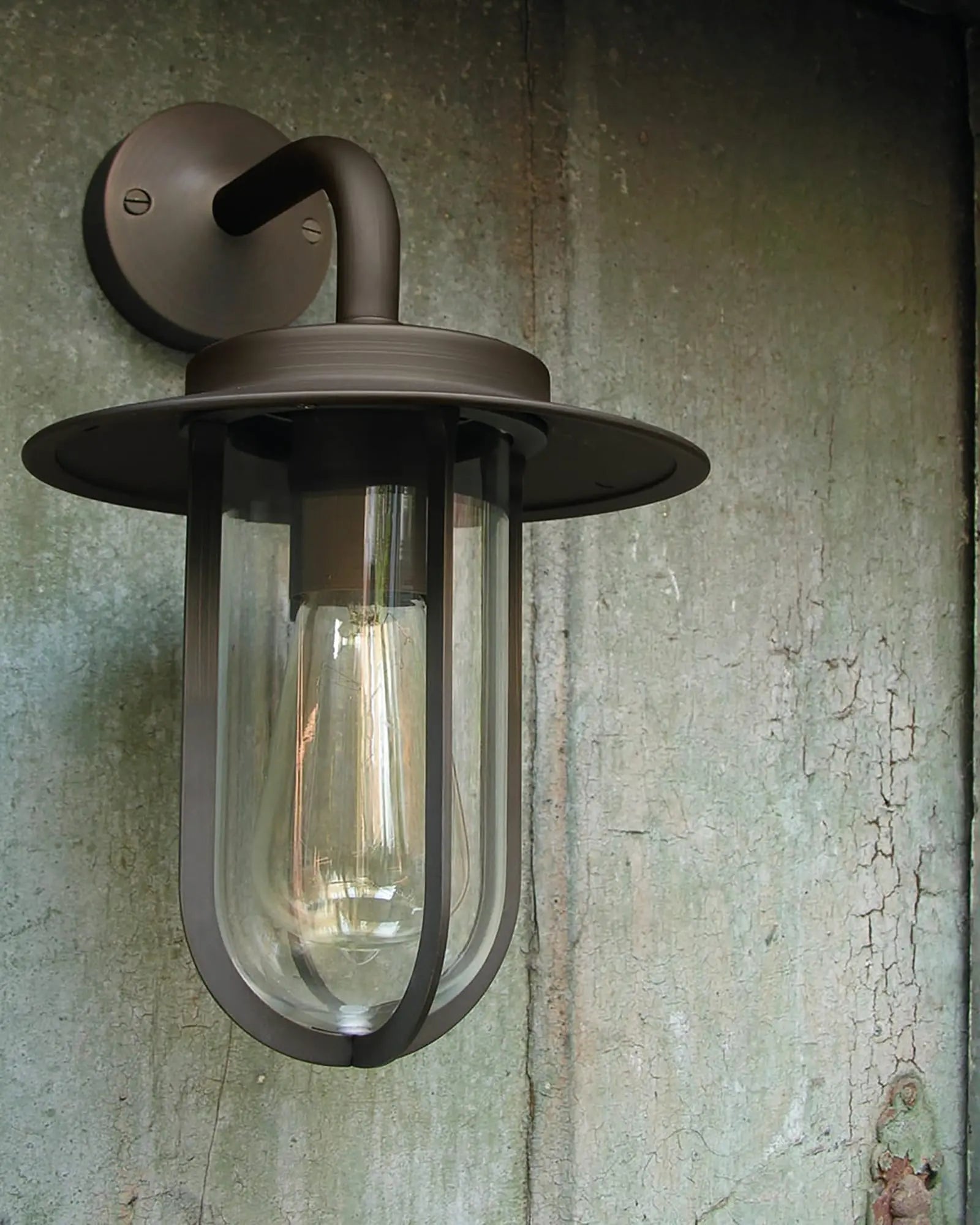 Montparnasse outdoor lantern style wall light detail on concrete wall