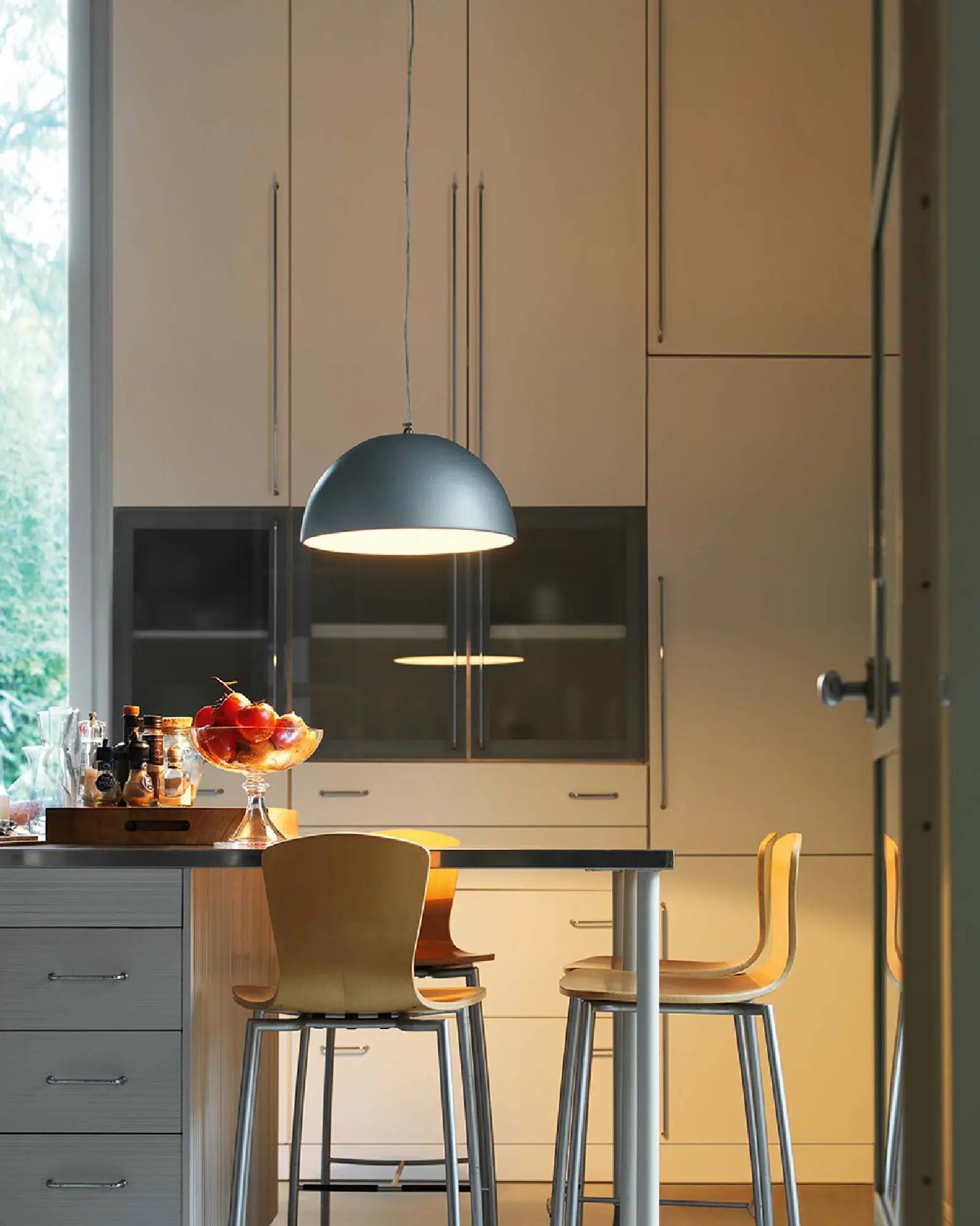 Moonlight pendant light above a kitchen island