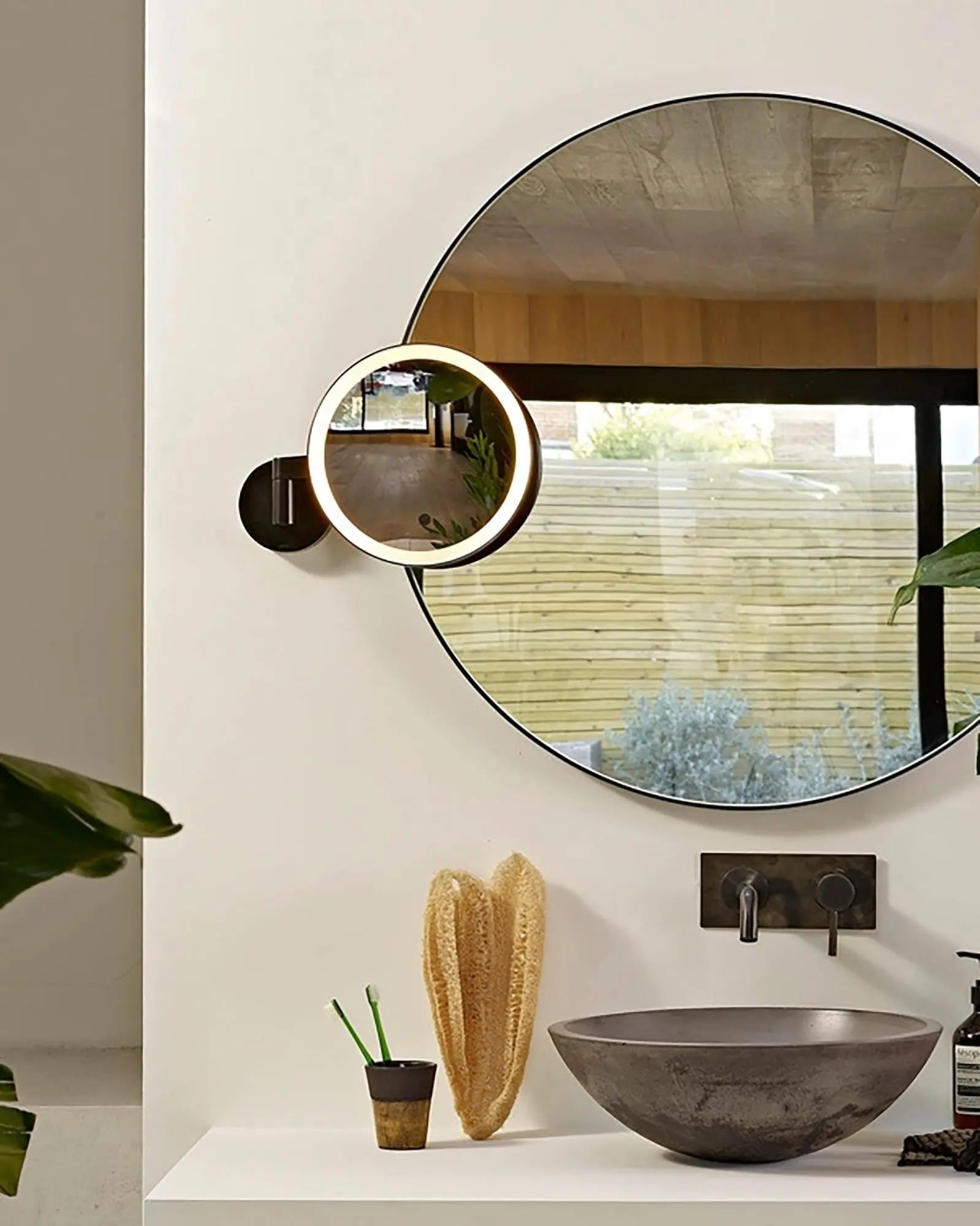 Nagoya magnifyng mirror with makeup light in a bathroom