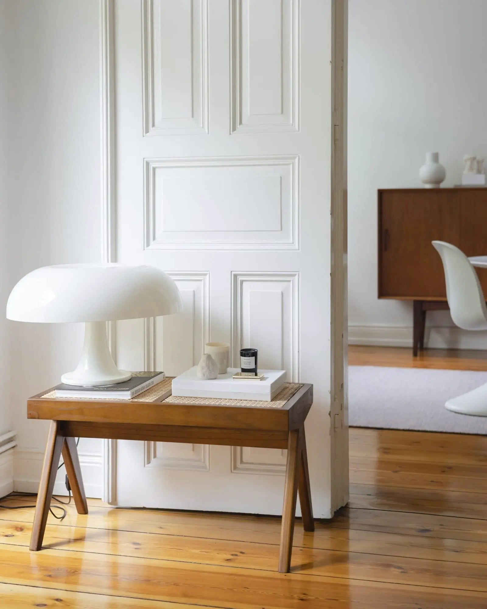Nesso Table Lamp iconic Italian designer on a wooden stool