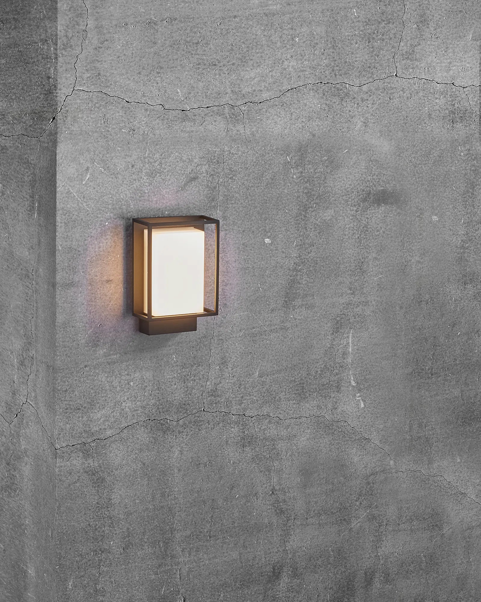 Nestor modern Scandinavian outdoor wall light on concrete wall
