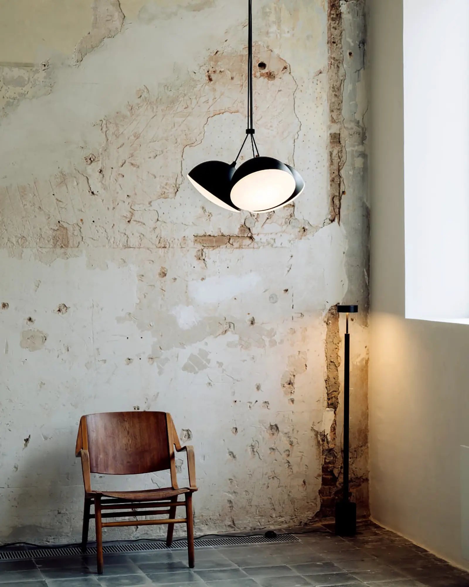 Nod pendant light above a living area