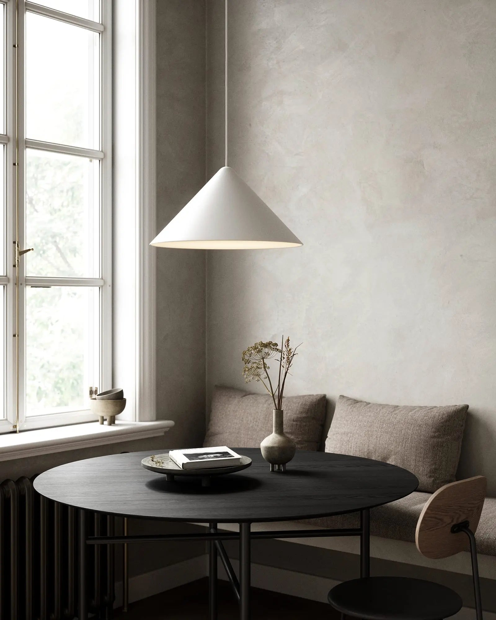 Nono pendant light above a round table