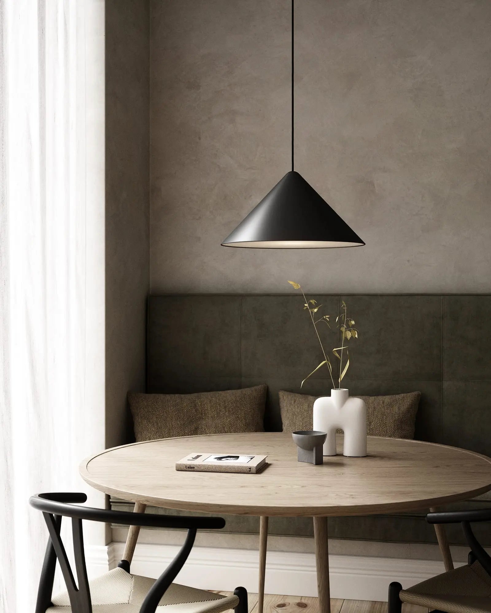 Nono pendant light above a round table
