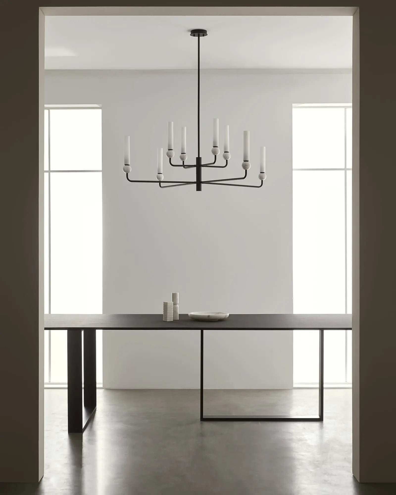 Delie 8 pendant light marble sphere and opal glass shade above dining table