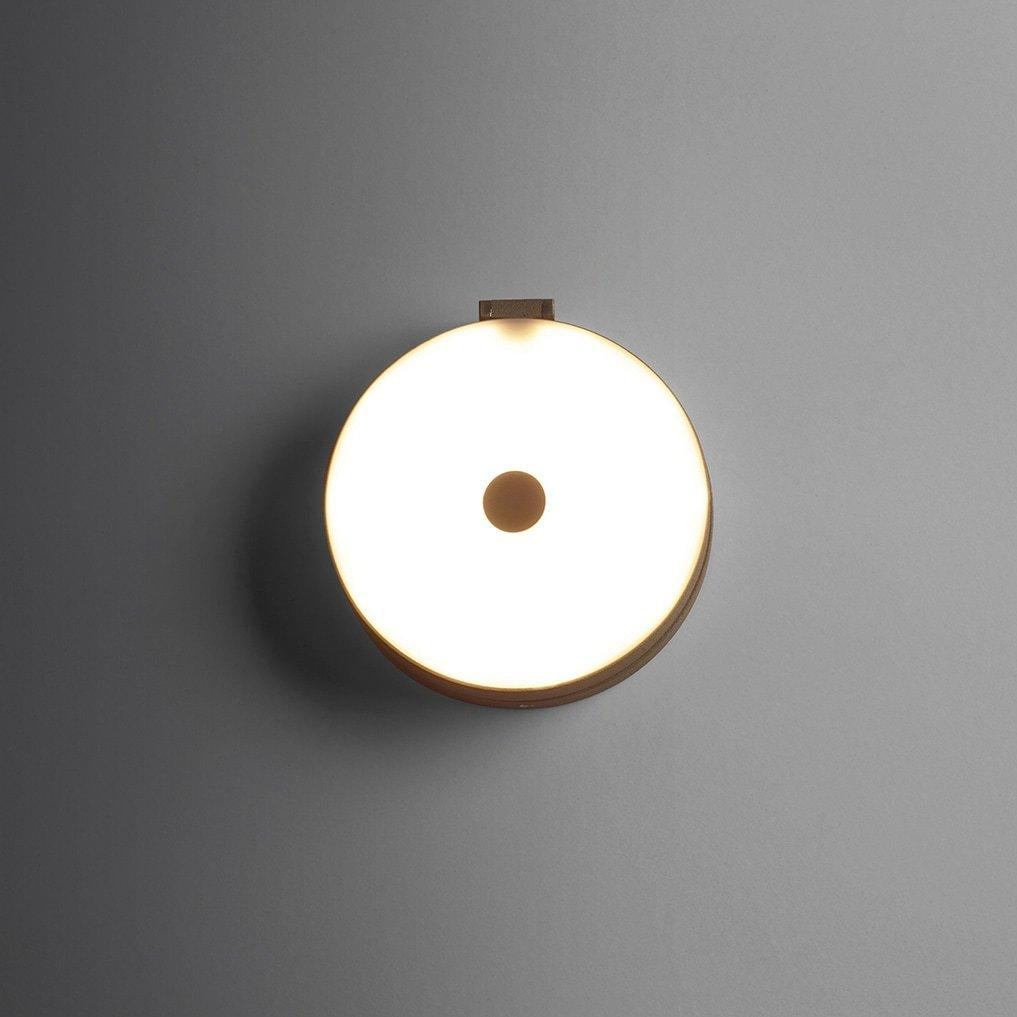 Olimpia modern adjustable round bedroom wall light by Cattaneo
