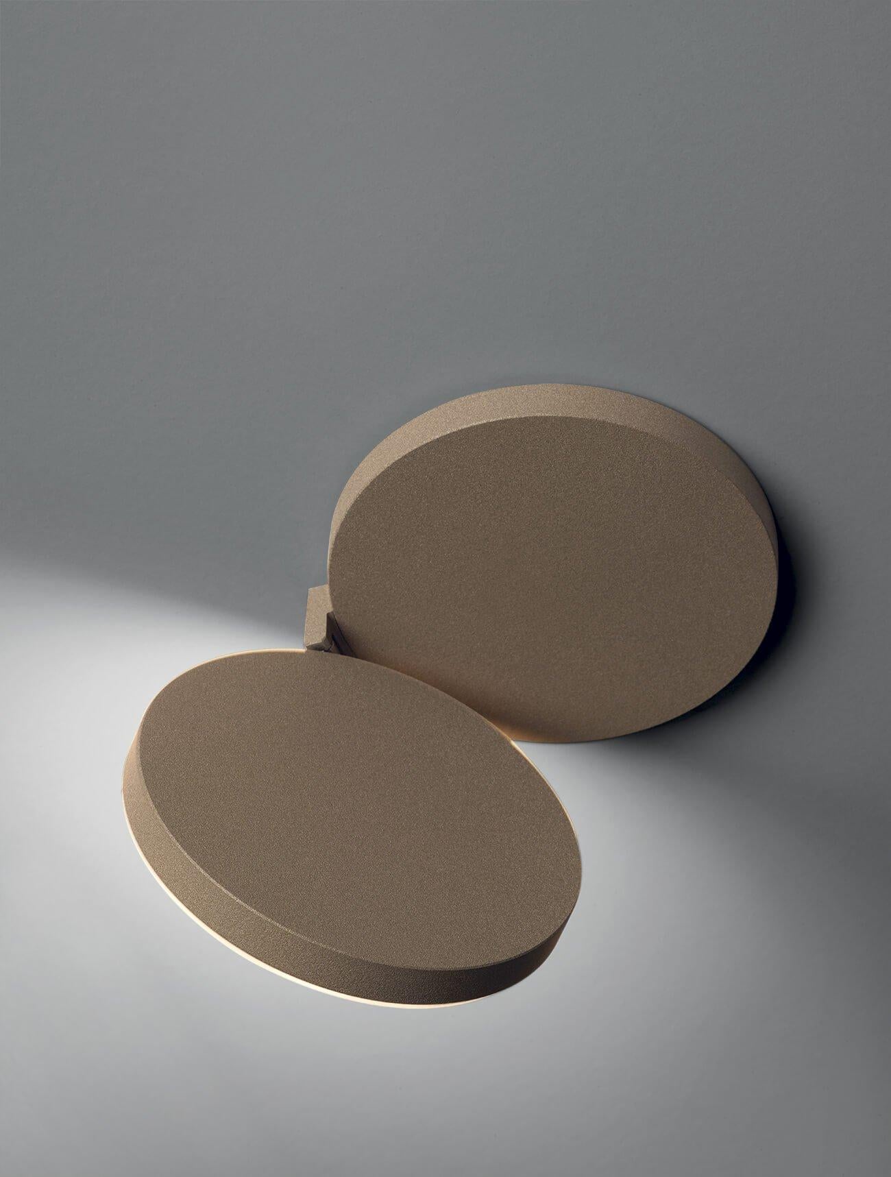 Olimpia modern adjustable round bedroom wall light by Cattaneo sandy