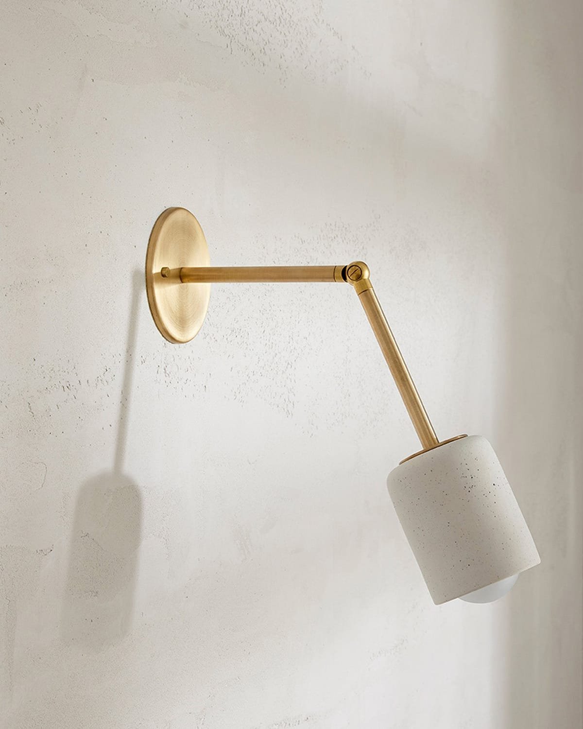 Terra 1 Long Arm Wall Light in Vanilla Bean ceramic finish with brass finish. -Nook Collections