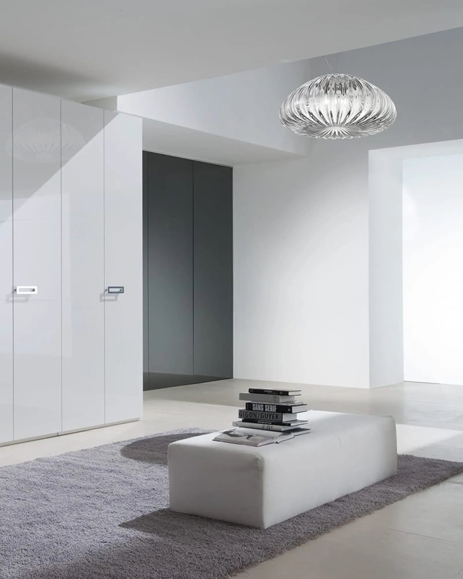 Diamante blown glass venetian pendant light above a seat in a living area