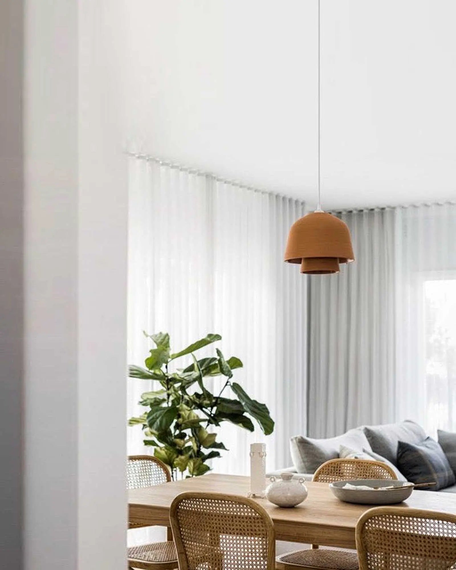 Okina Double pendant light above a dining table