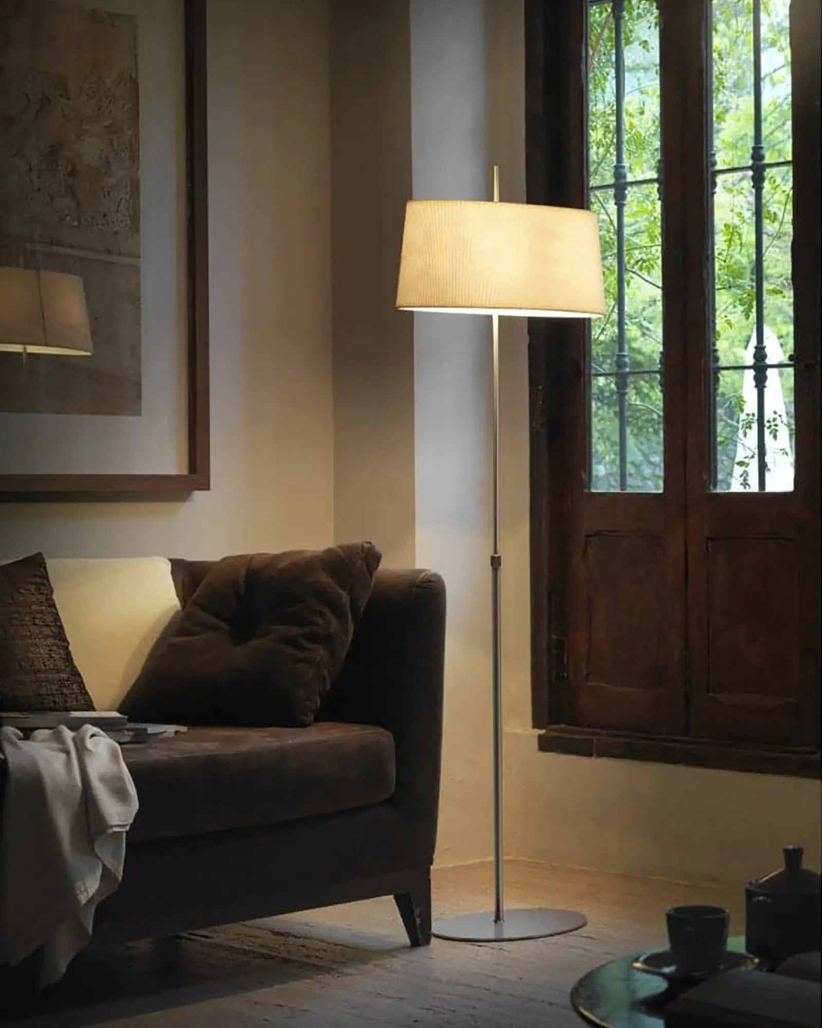 Ona classic floor lamp with fabric shade and adjustable stem lounge area