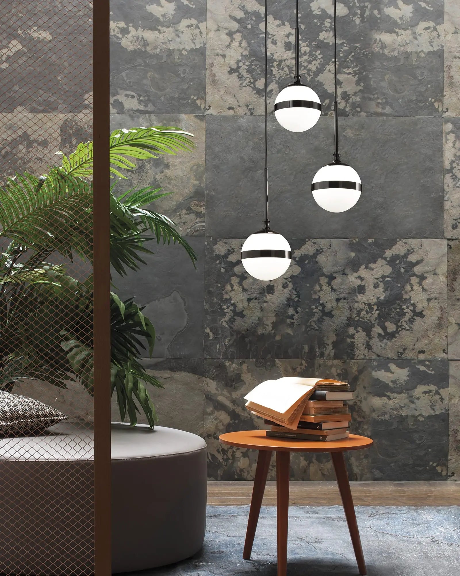 Peggy 1 orb shade contemporary pendant above a coffee table