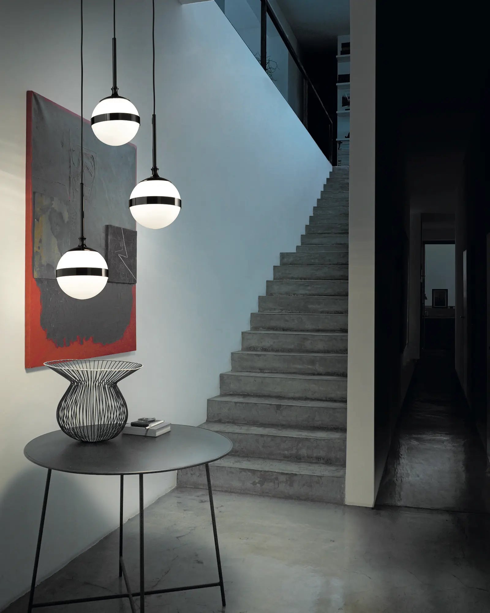 Peggy 1 orb shade contemporary pendant cluster above a coffee table