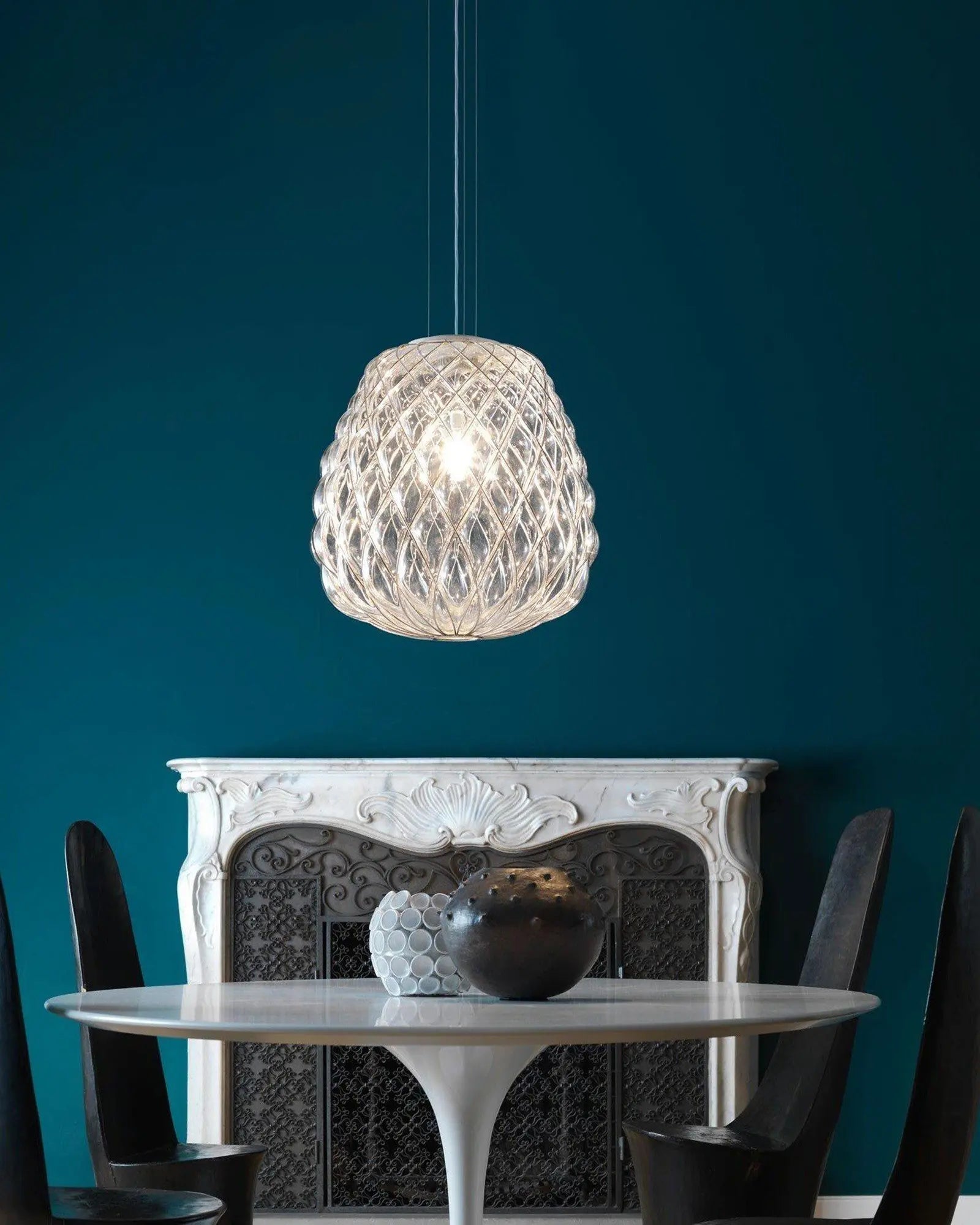 Pinecone pendant light above a table