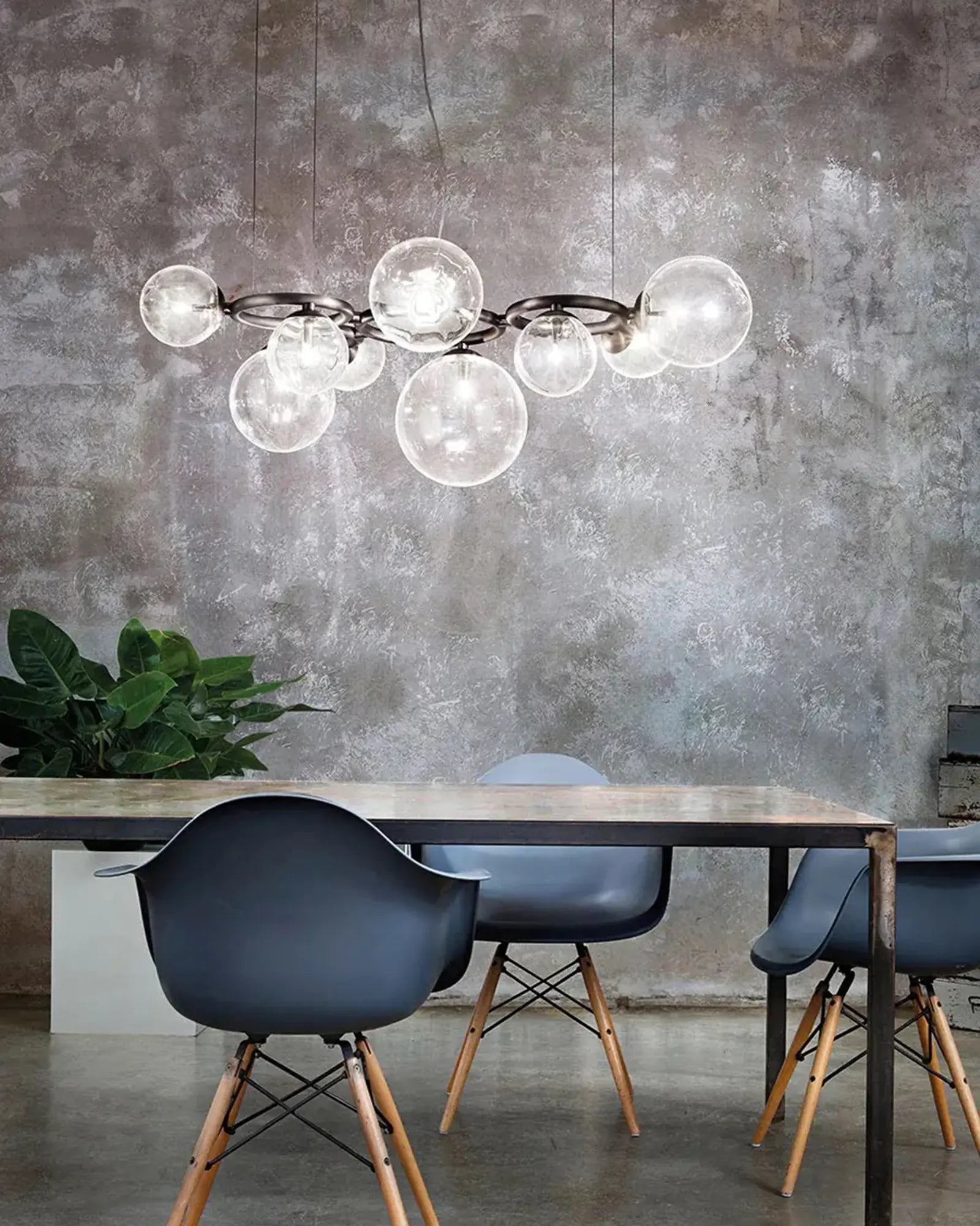 Puppet Ring classic blown murano glass pendant light above a meeting table