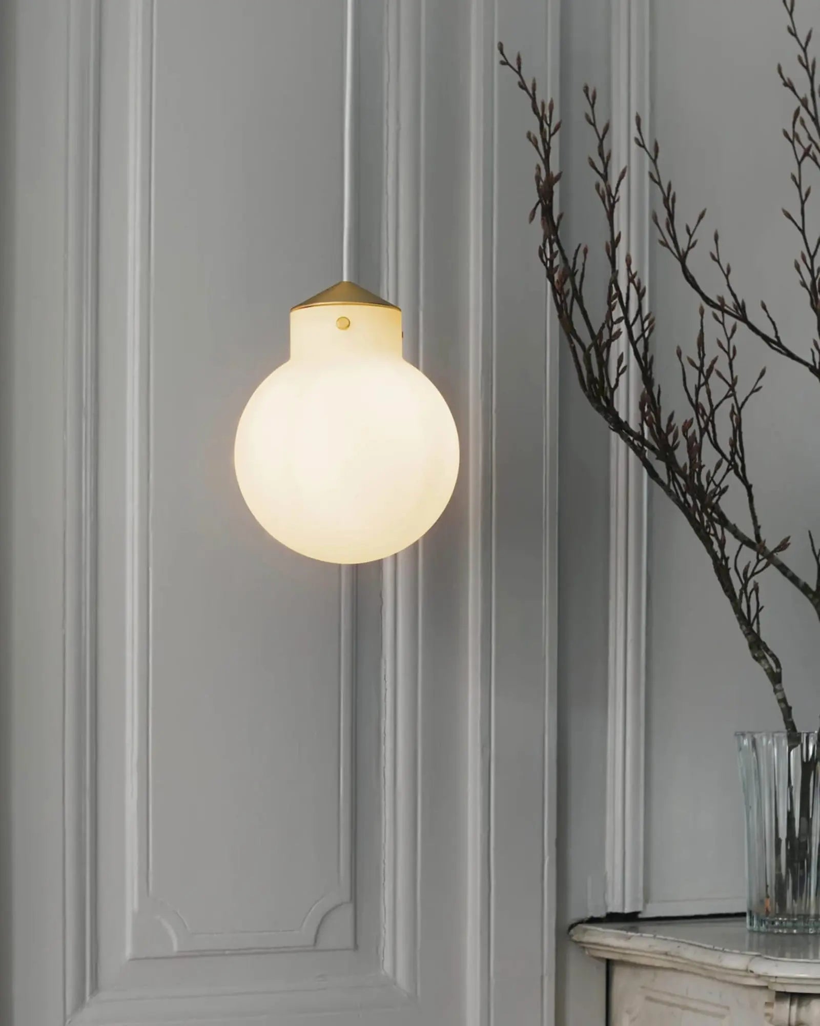 Raito opal glass orb and brass pendant light