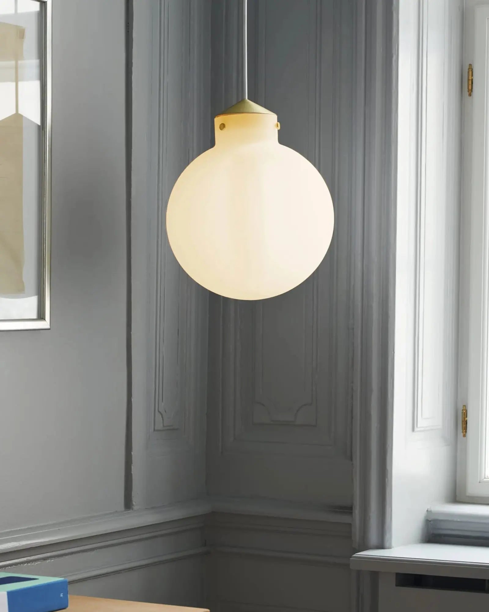 Raito opal glass orb and brass pendant light