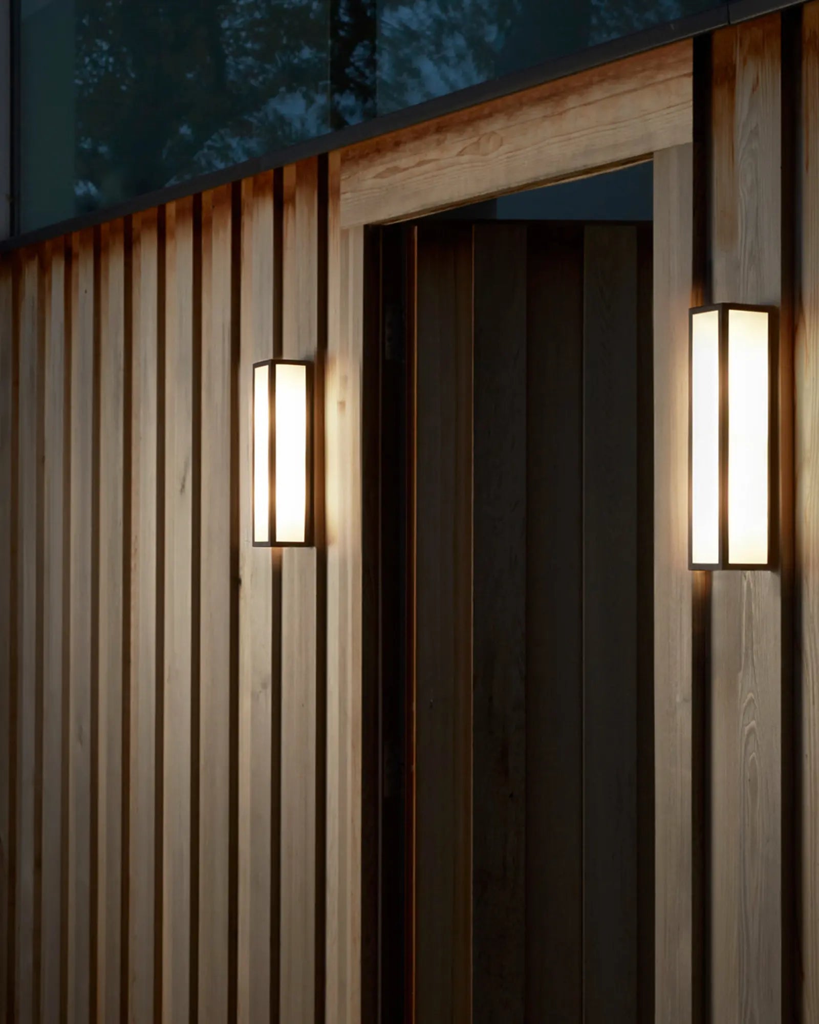 Salerno metal and opal glass rectangular contemporary wall light on a cladded wall outdoor