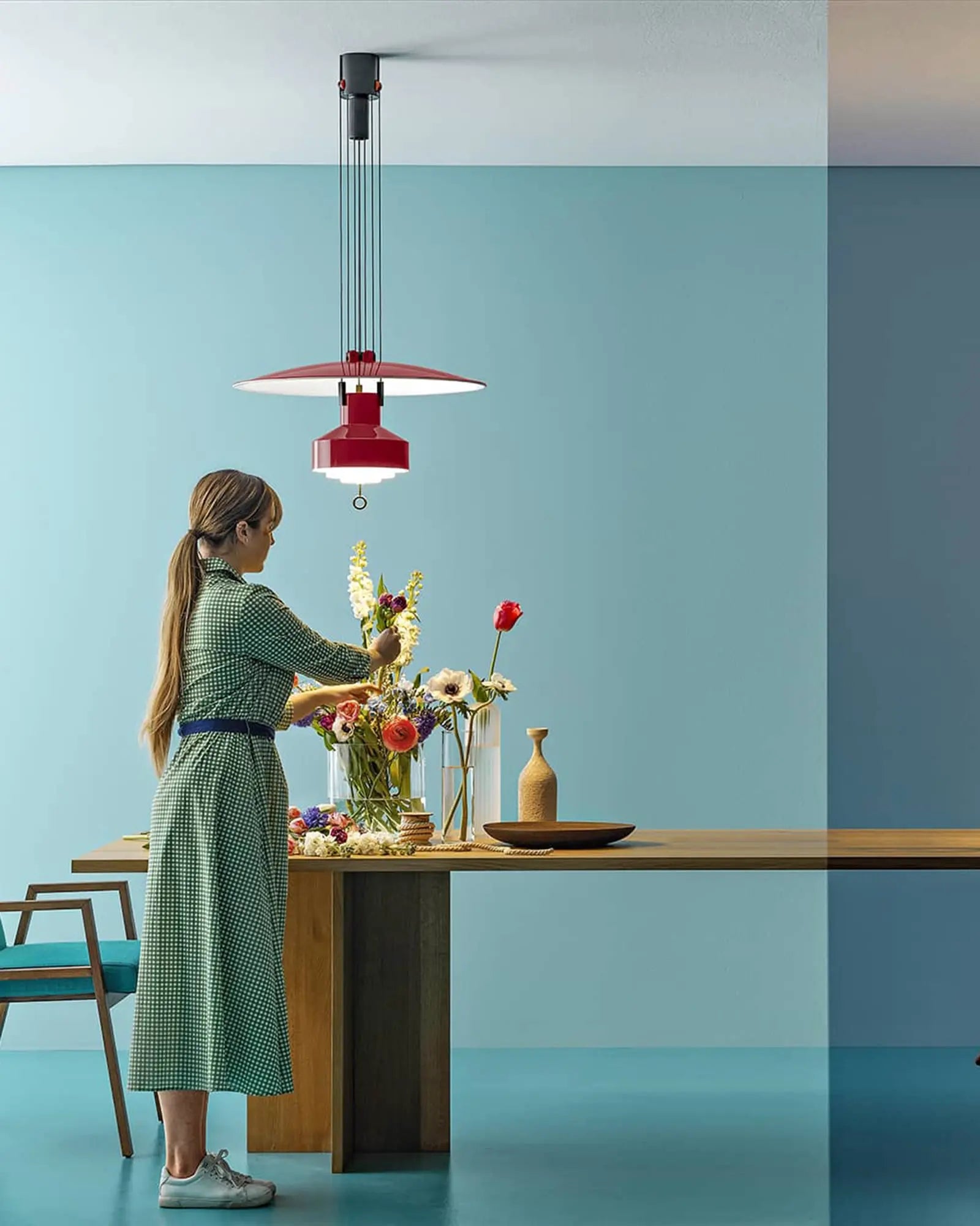 Saliscendi Pendant light above a dining table