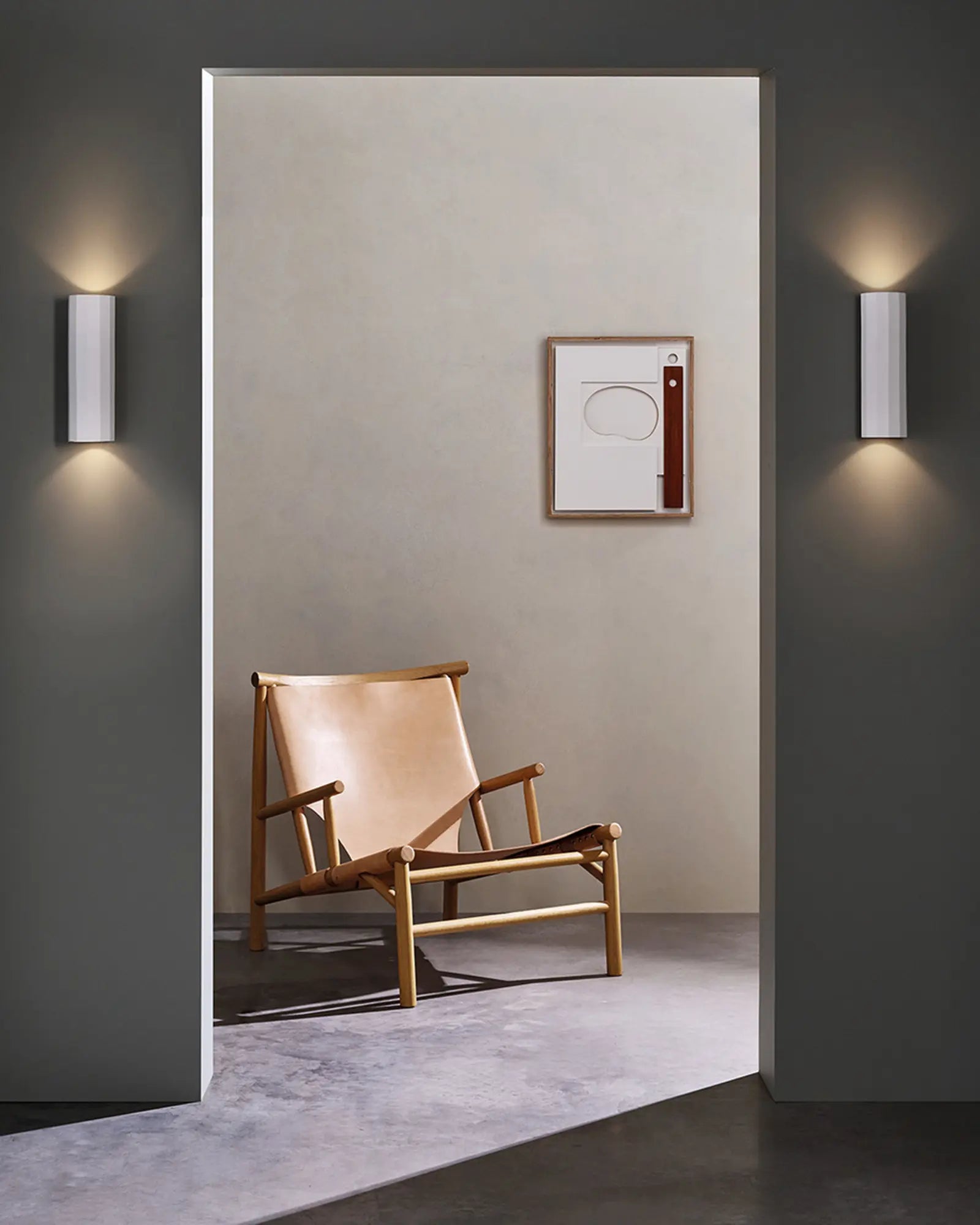 Shadow plaster minimal wall light in a hallway
