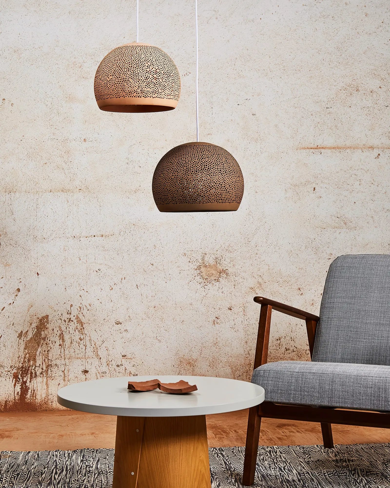 Sponge Up pendant light cluster above a coffee table