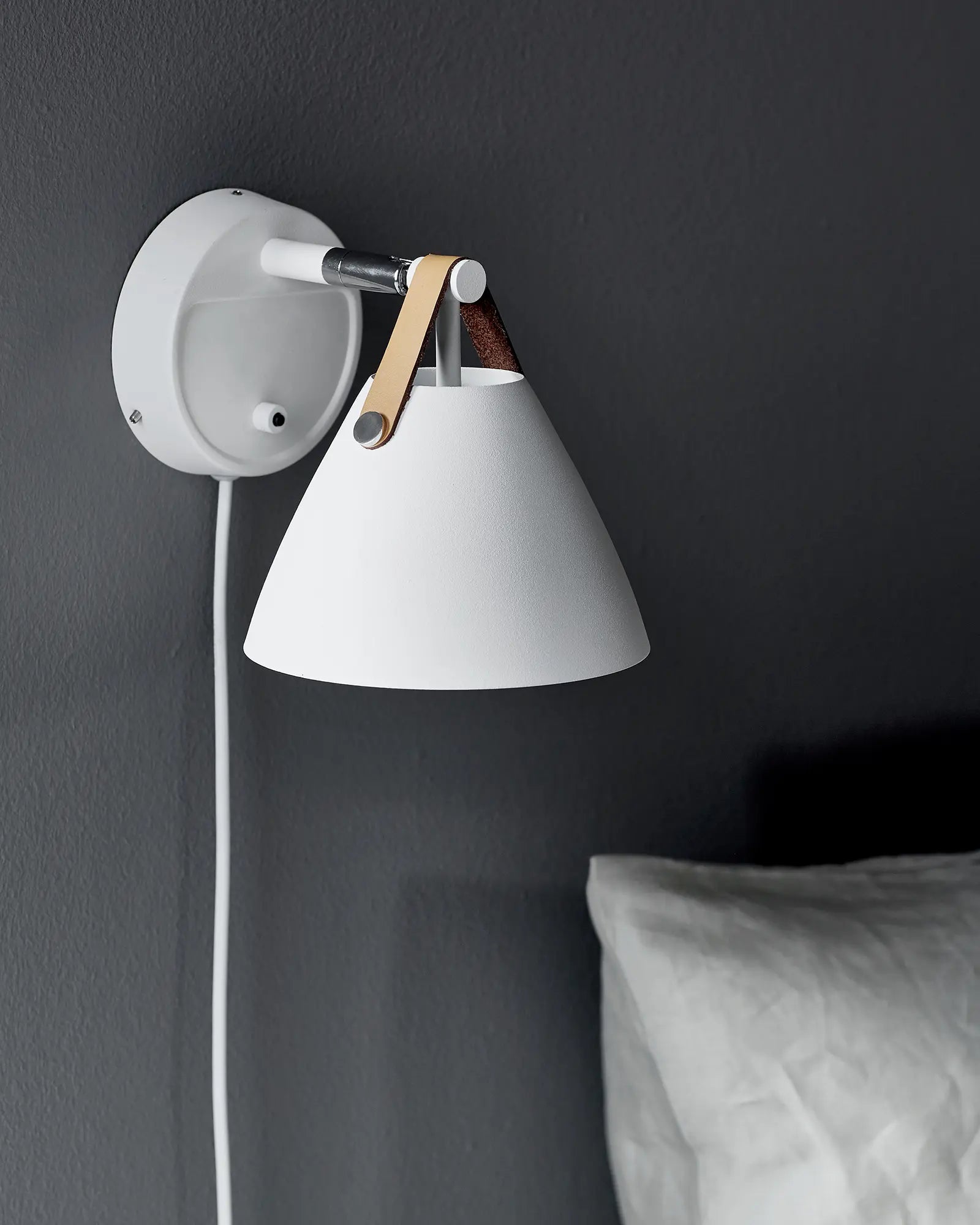 Strap scandinavian wall light bed side detail