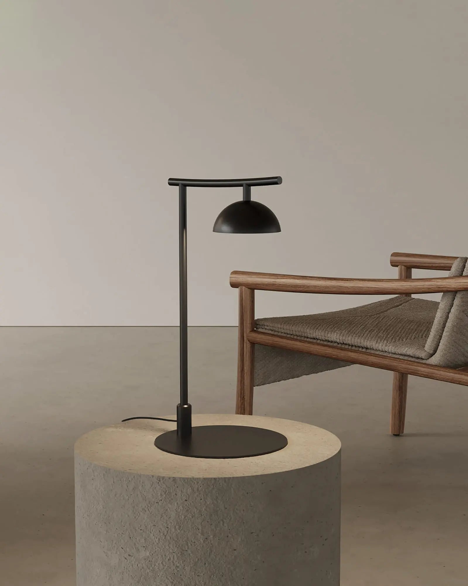 Tana minimalist scandinavian dome shade table lamp on a coffee table in a living area
