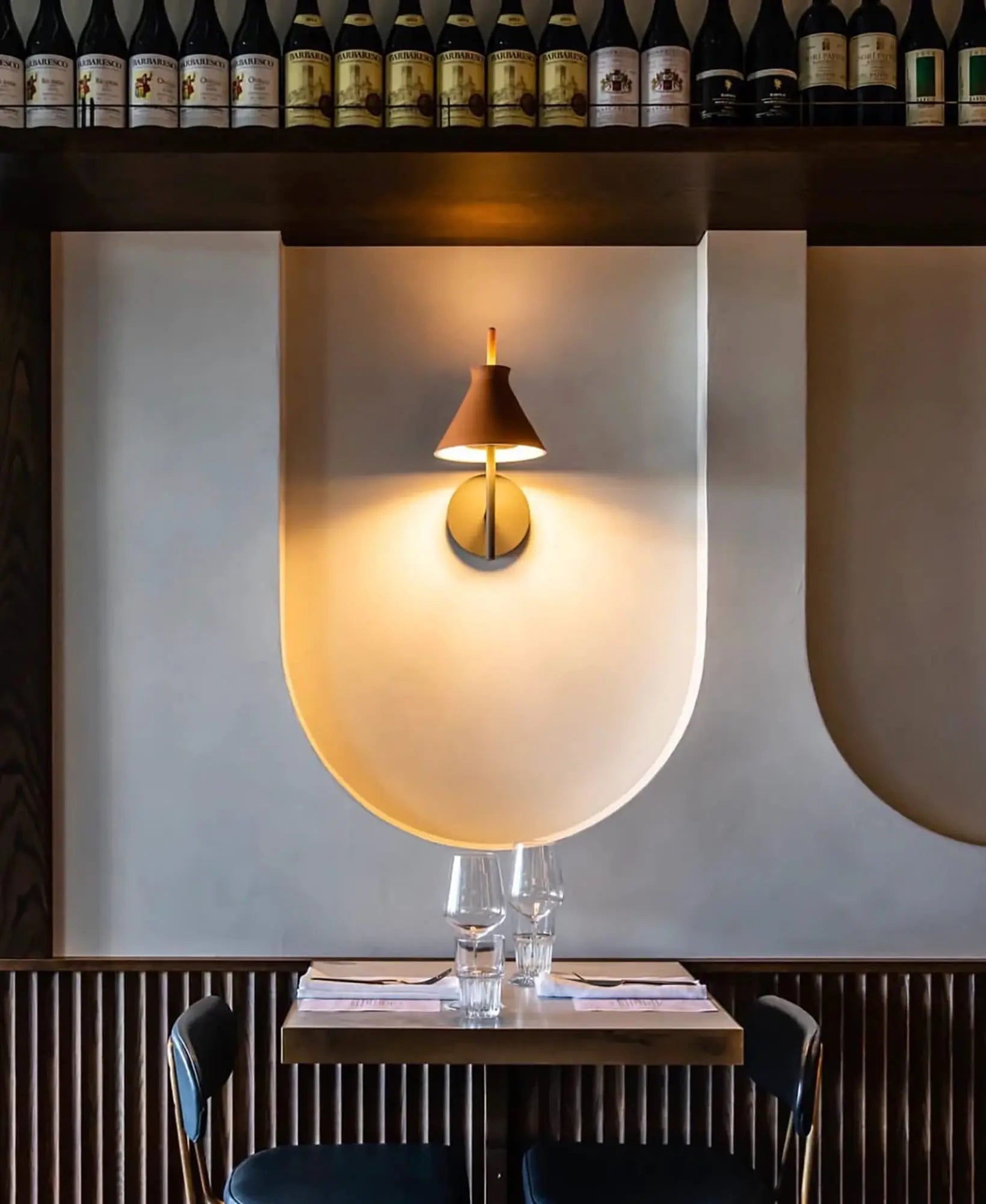 Totana Wall Light above a table restaurant