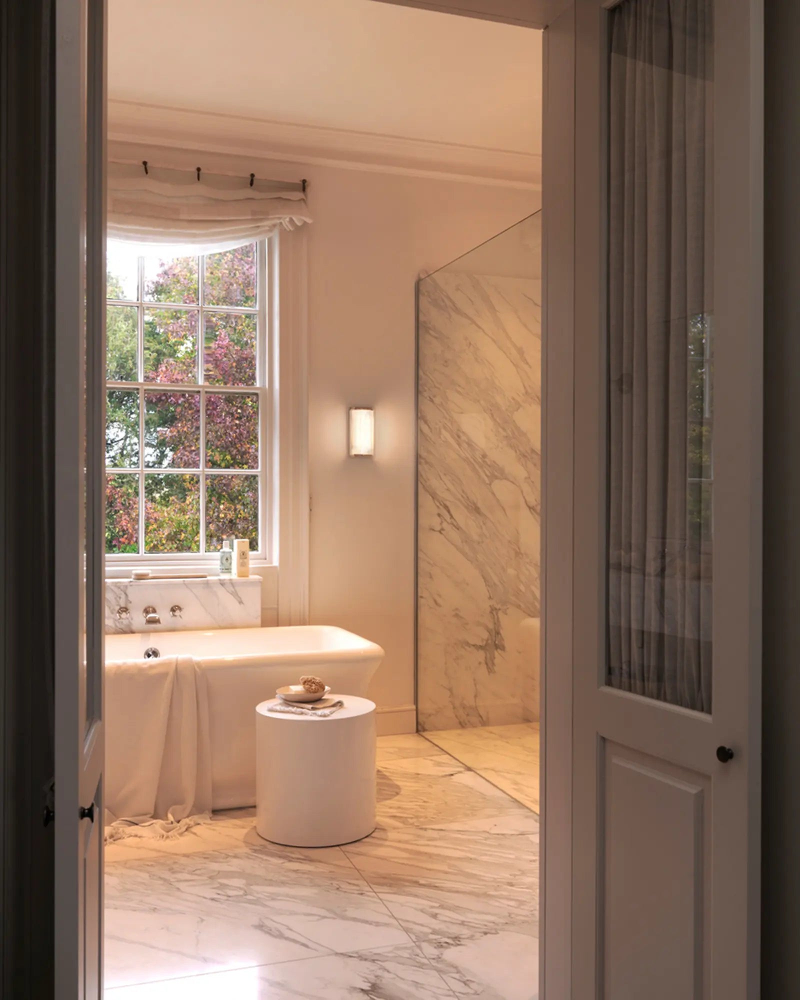 Versailles 250 bathroom wall light above a bath tub