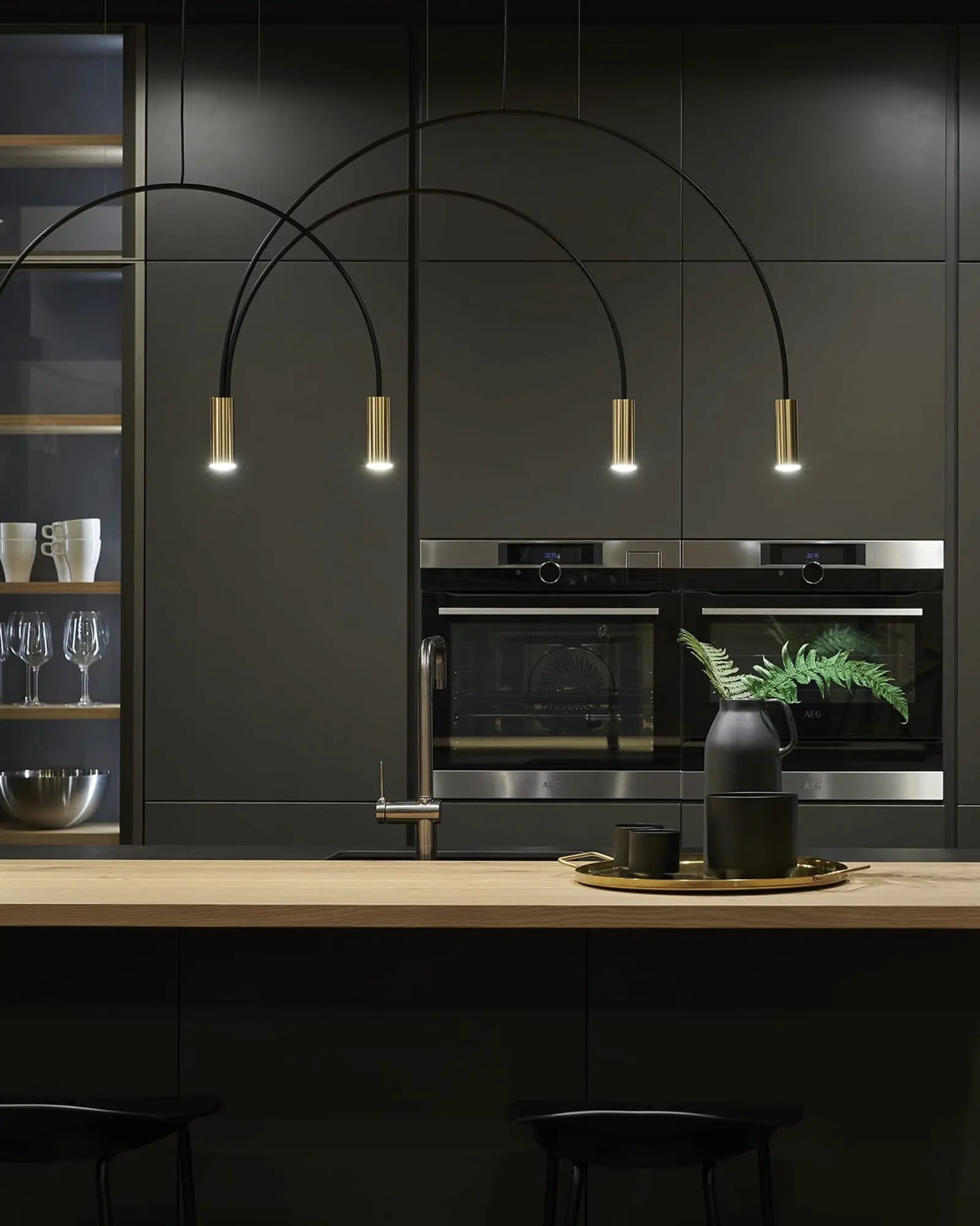Volta Linear pendant light by Estiluz Lighting above a kitchen island
