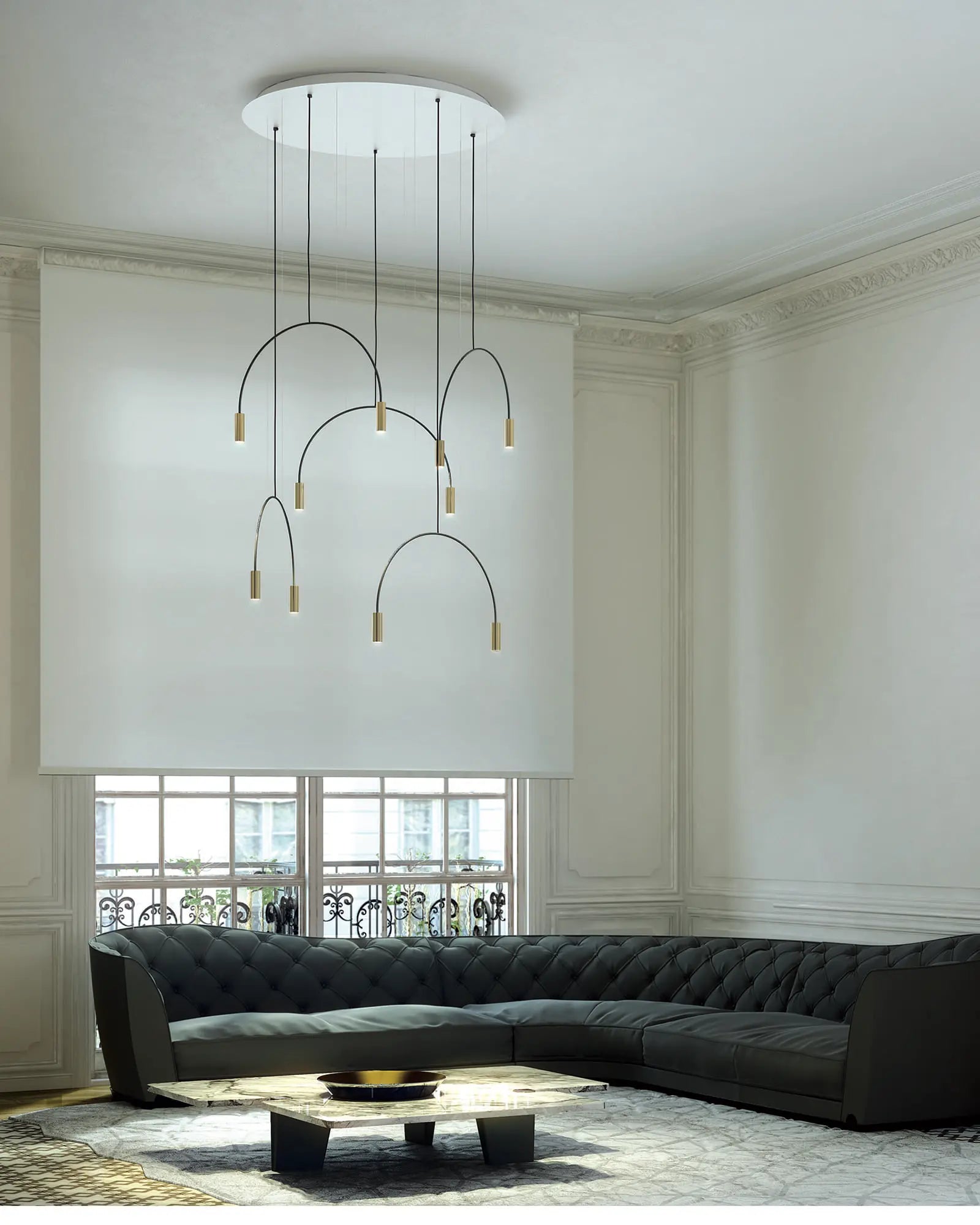 Volta Linear pendant light by Estiluz Lighting circular cluster above a coffee table