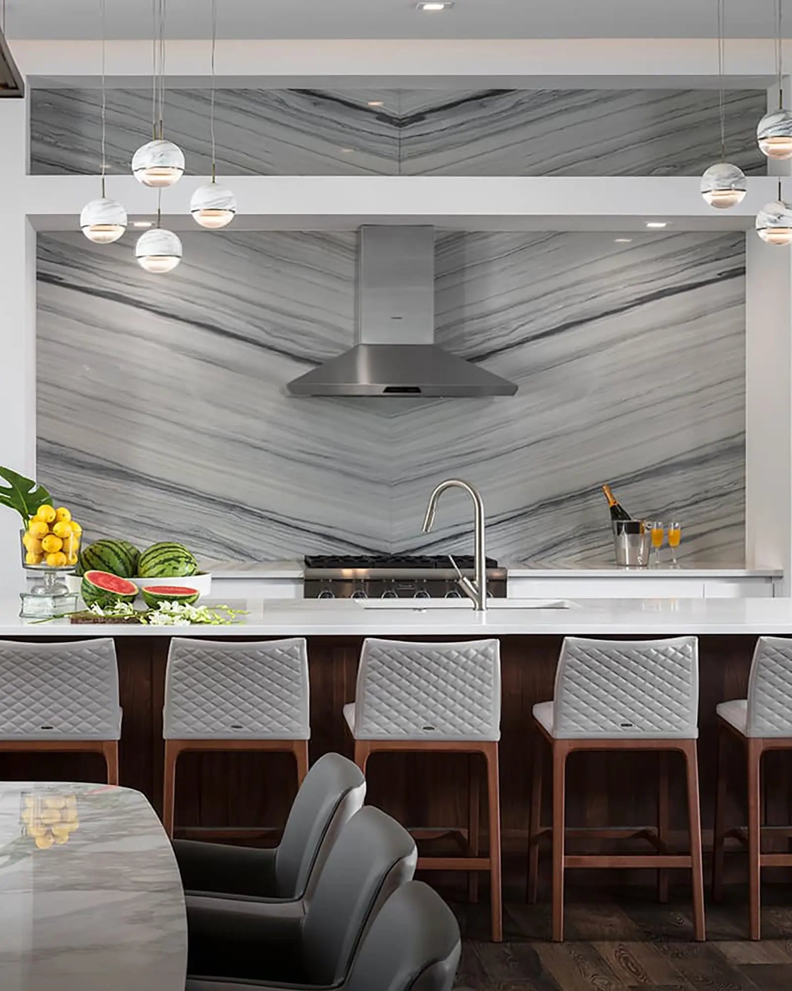 Wandering star pendant light cluster above a kitchen