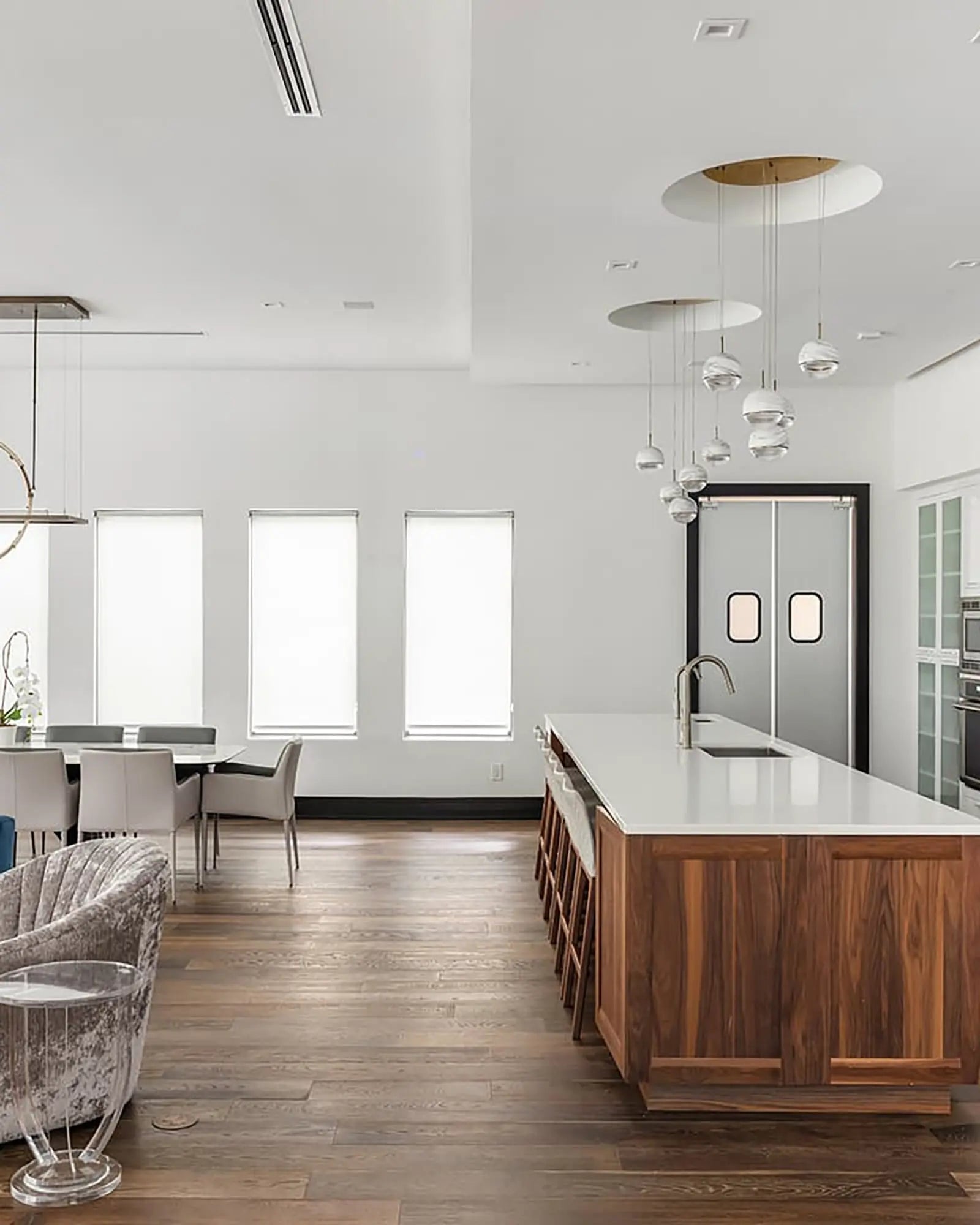 Wandering star pendant light above a kitchen