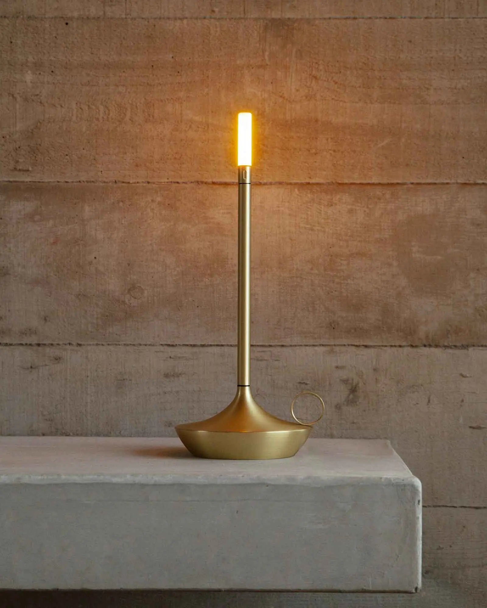 Wick Table lamp on a concrete seat