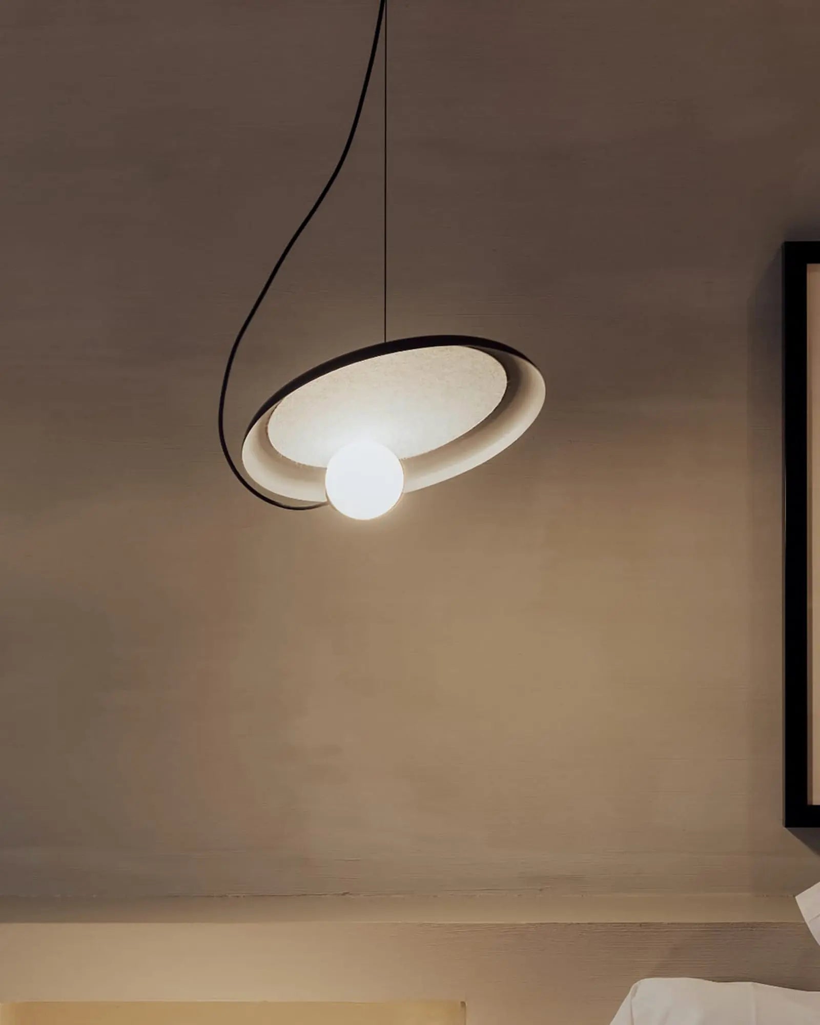 Wire pendant light in a living area