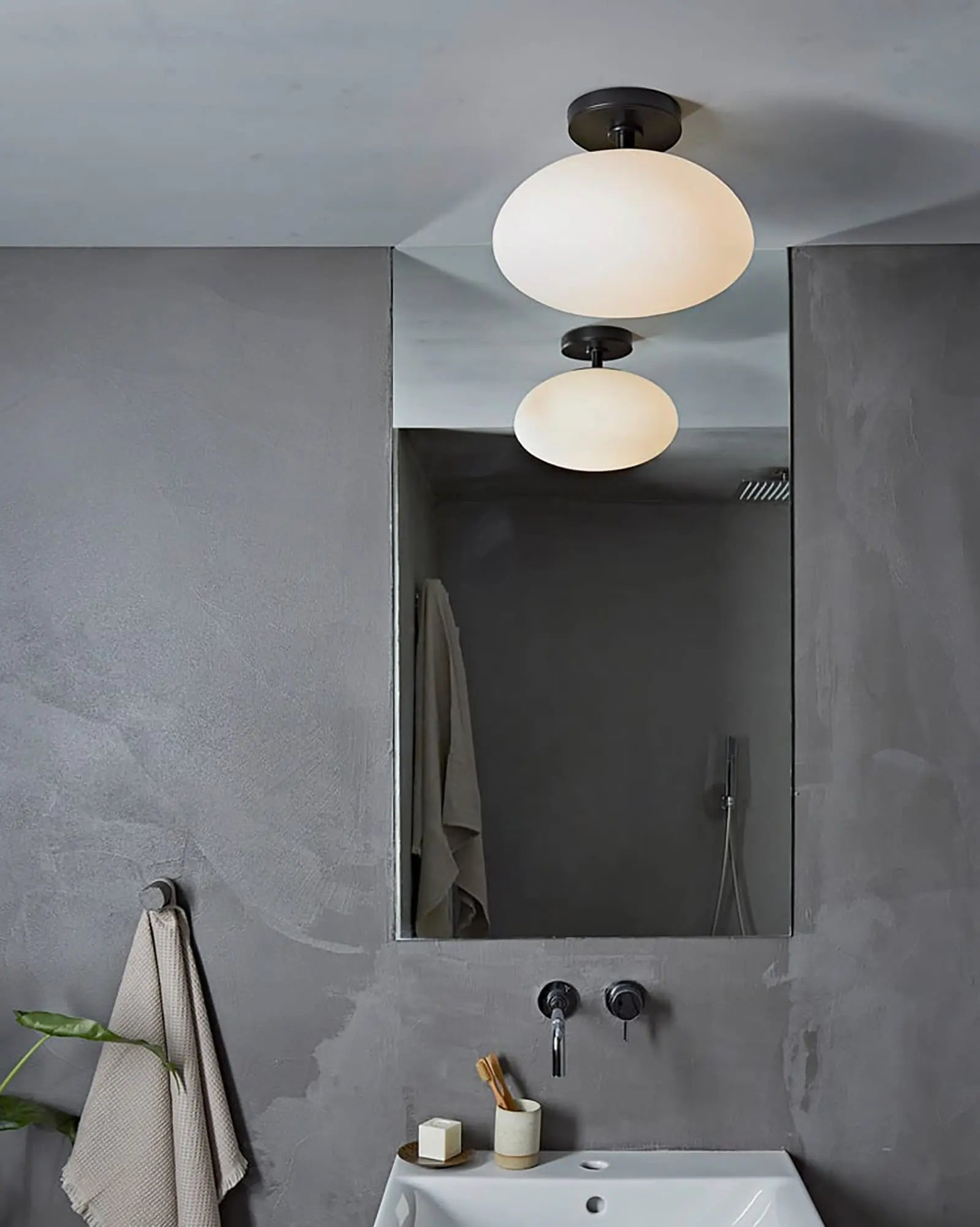 Zeppo orb glass ceiling light in a bathroom