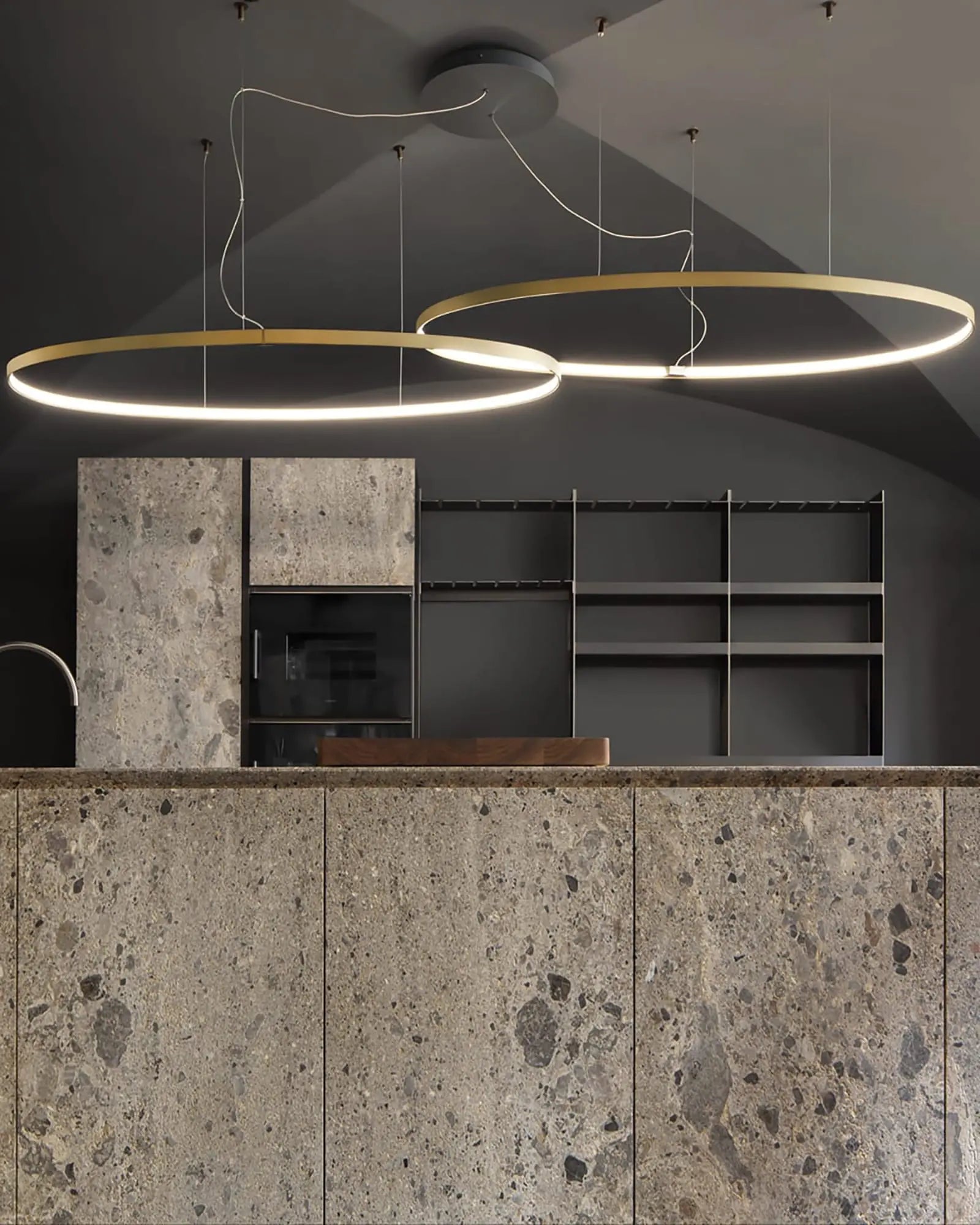 zero ellipse pendant lights cluster over a kitchen island